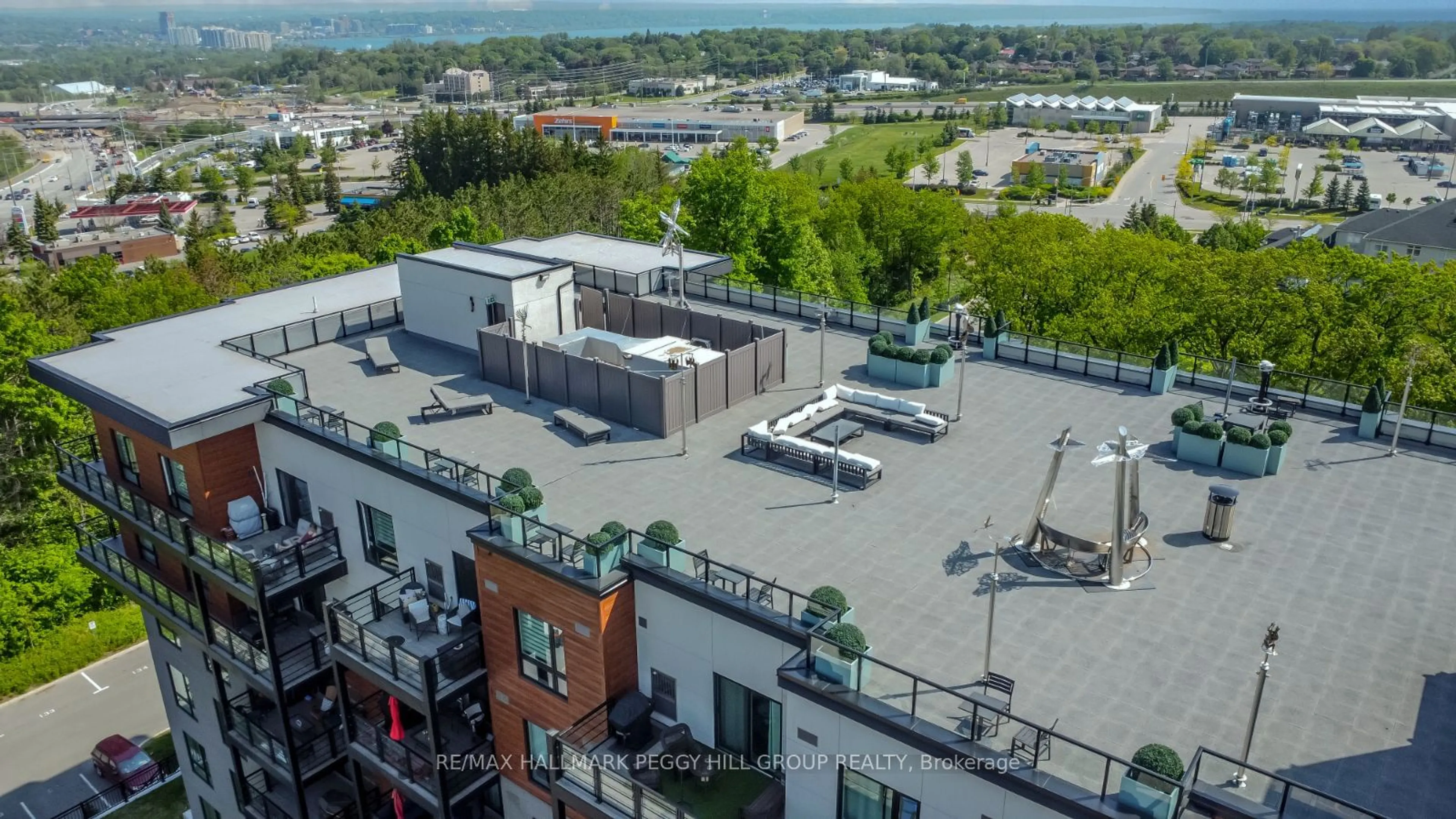 A pic from outside/outdoor area/front of a property/back of a property/a pic from drone, city buildings view from balcony for 302 Essa Rd #309, Barrie Ontario L9J 0H3