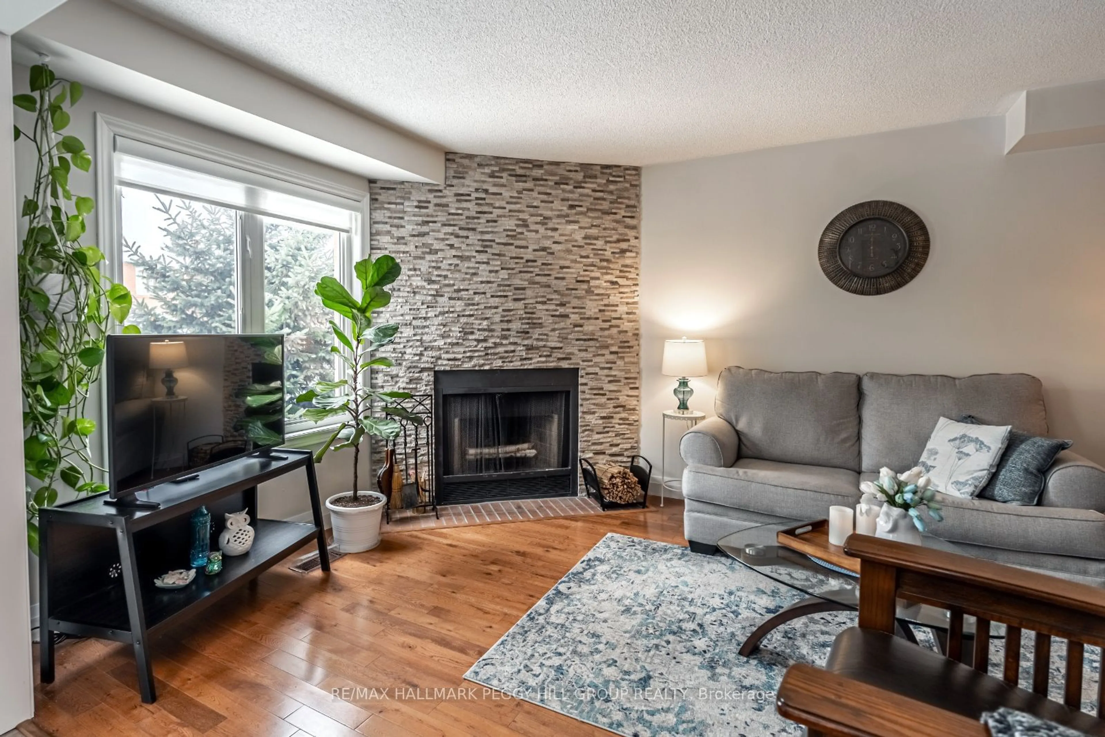 Living room with furniture, wood/laminate floor for 6 Mcdougall Dr, Barrie Ontario L4N 7J1