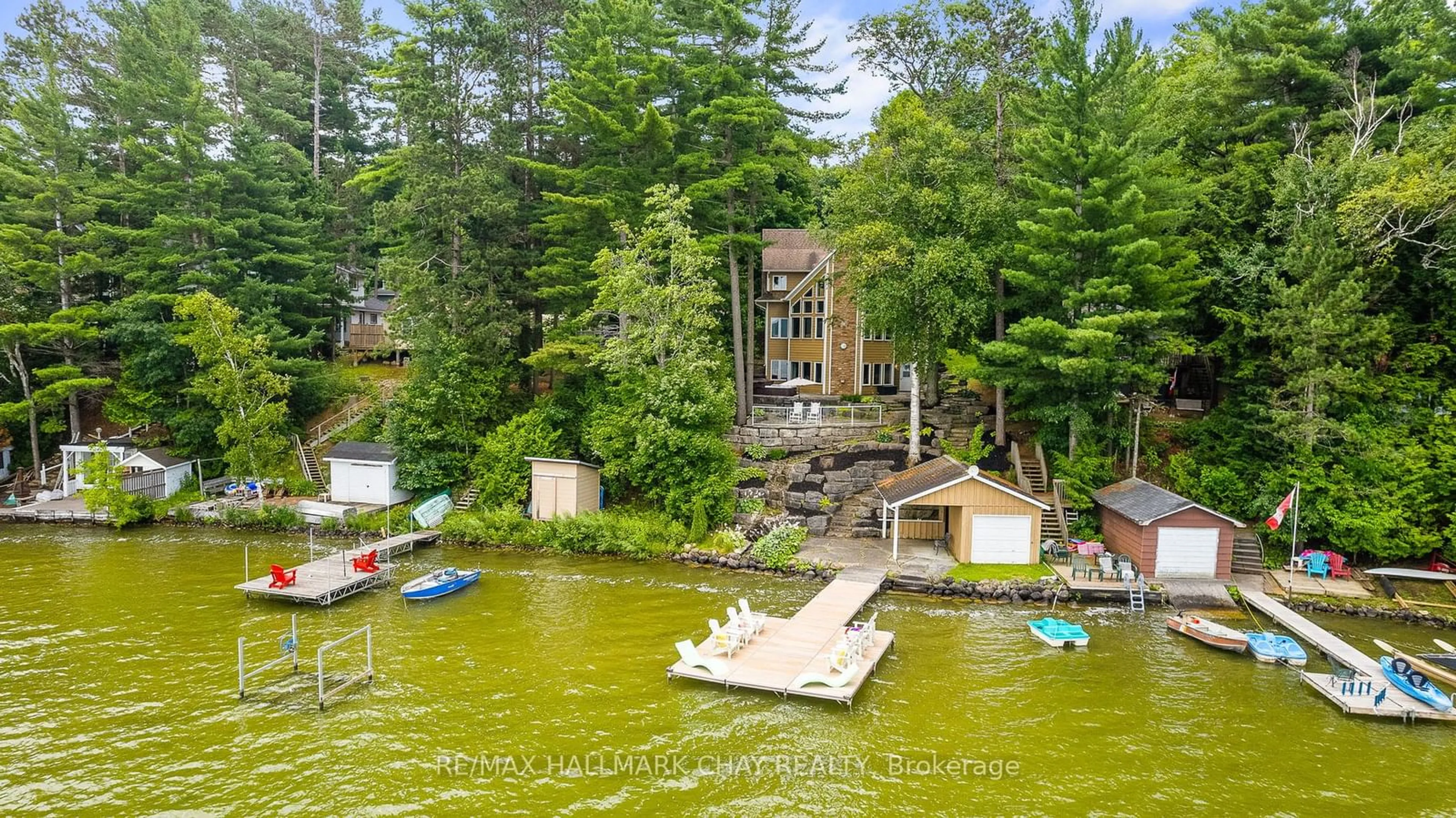 A pic from outside/outdoor area/front of a property/back of a property/a pic from drone, water/lake/river/ocean view for 2240 South Orr Lake Rd, Springwater Ontario L0L 1P0