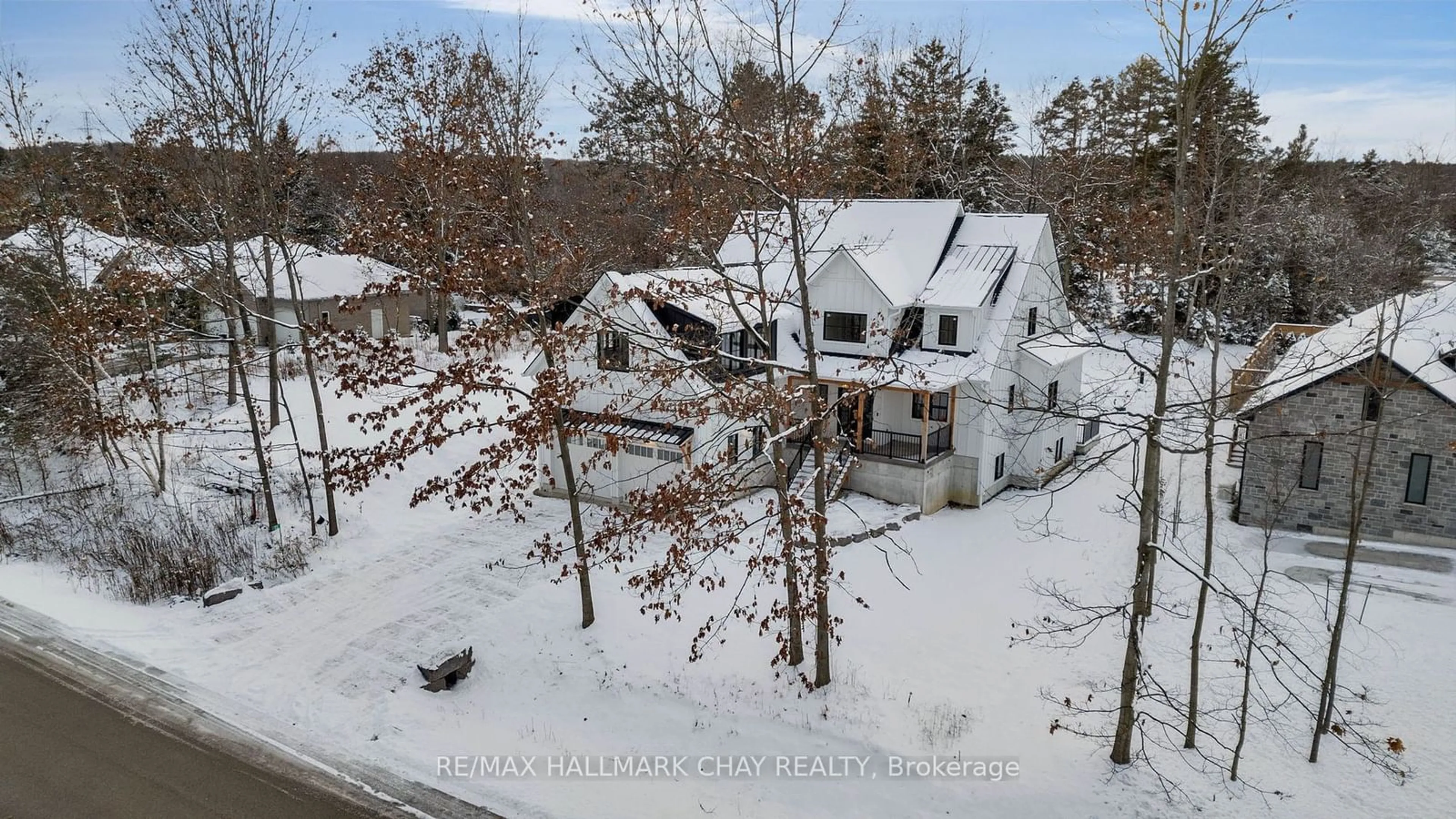 A pic from outside/outdoor area/front of a property/back of a property/a pic from drone, unknown for 25 Heatherwood Dr, Springwater Ontario L0L 1X1