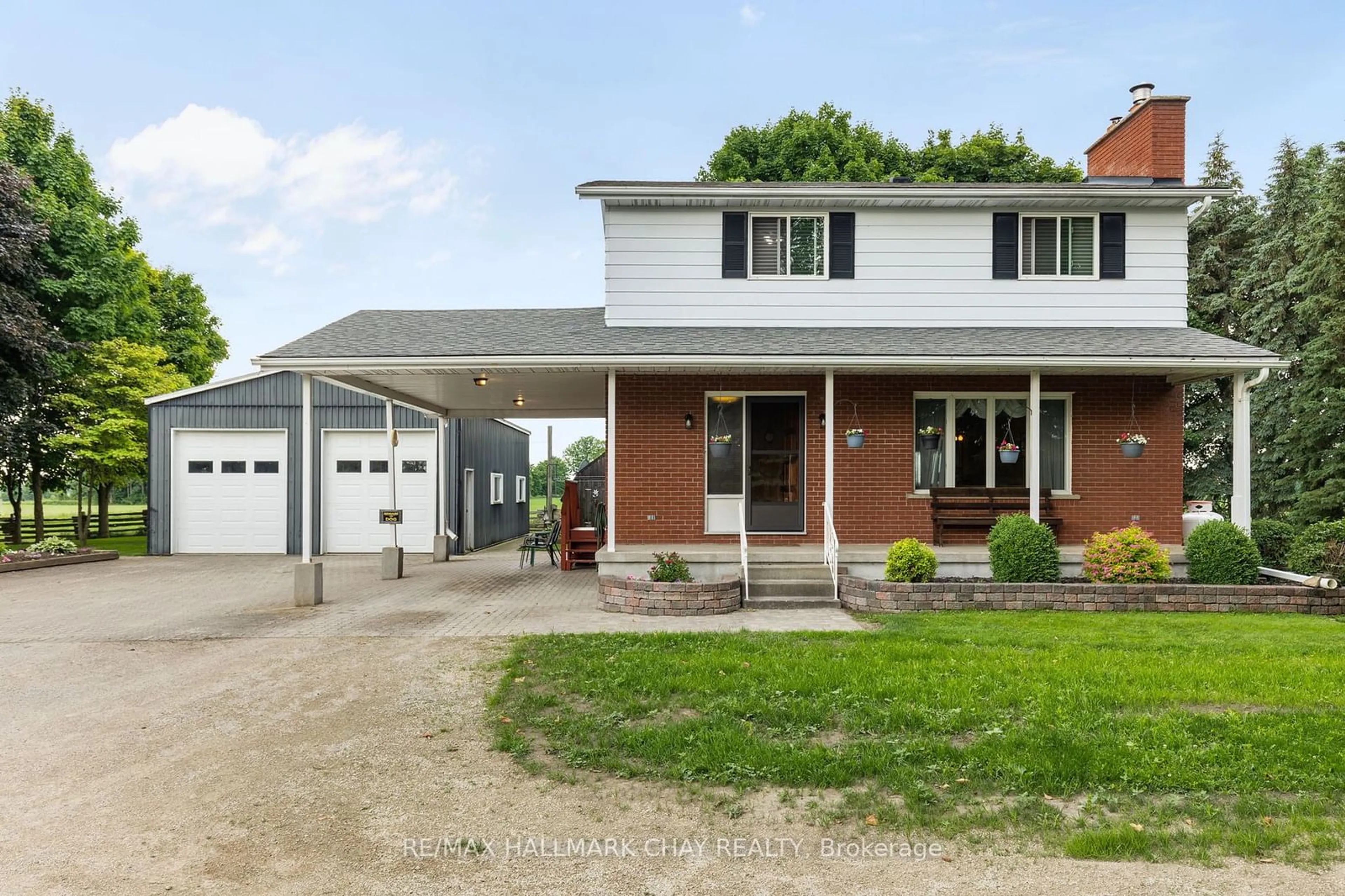 Home with brick exterior material, street for 3093 Hwy 26, Springwater Ontario L9X 0B5