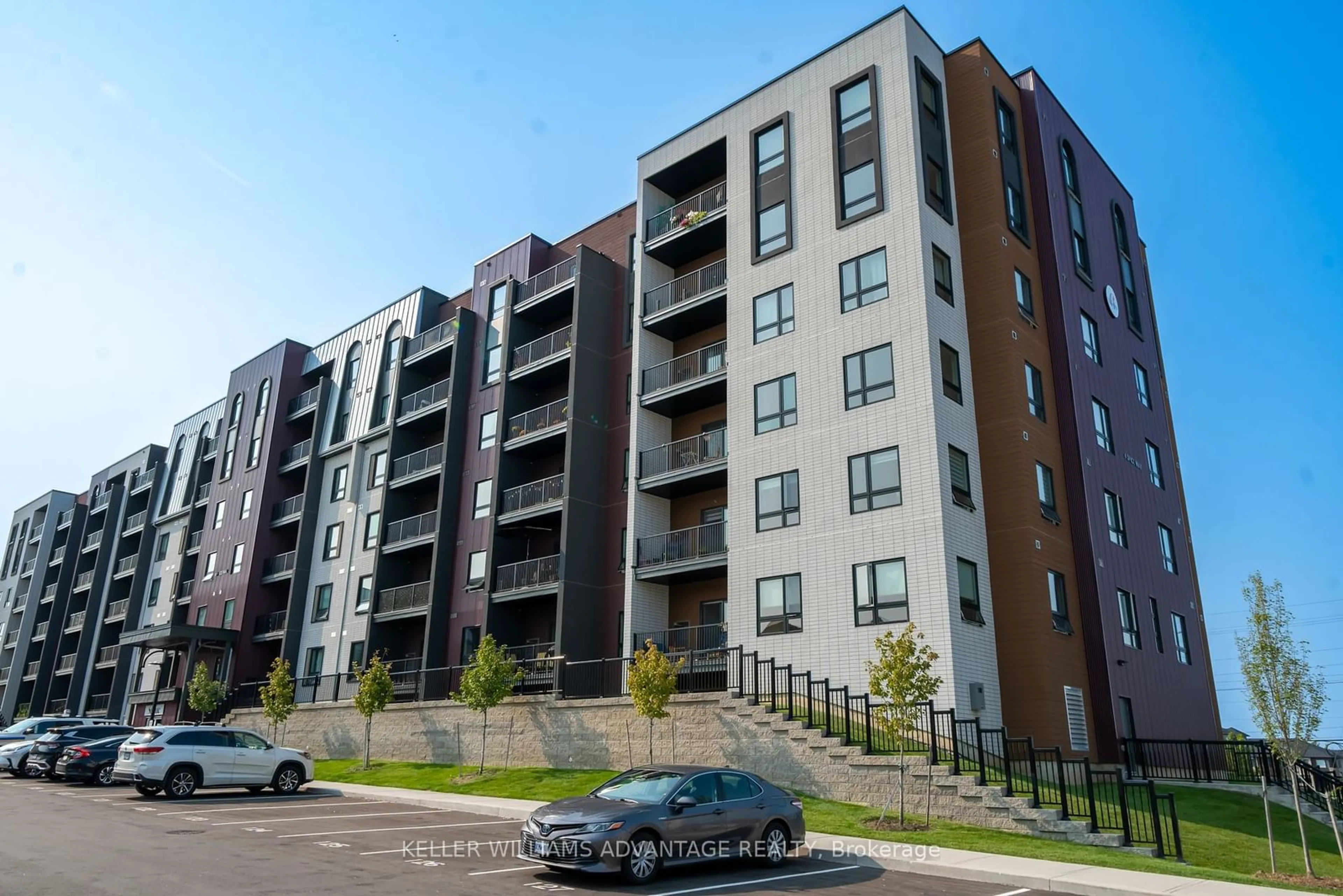 A pic from outside/outdoor area/front of a property/back of a property/a pic from drone, street for 4 Spice Way #104, Barrie Ontario L9J 0M2