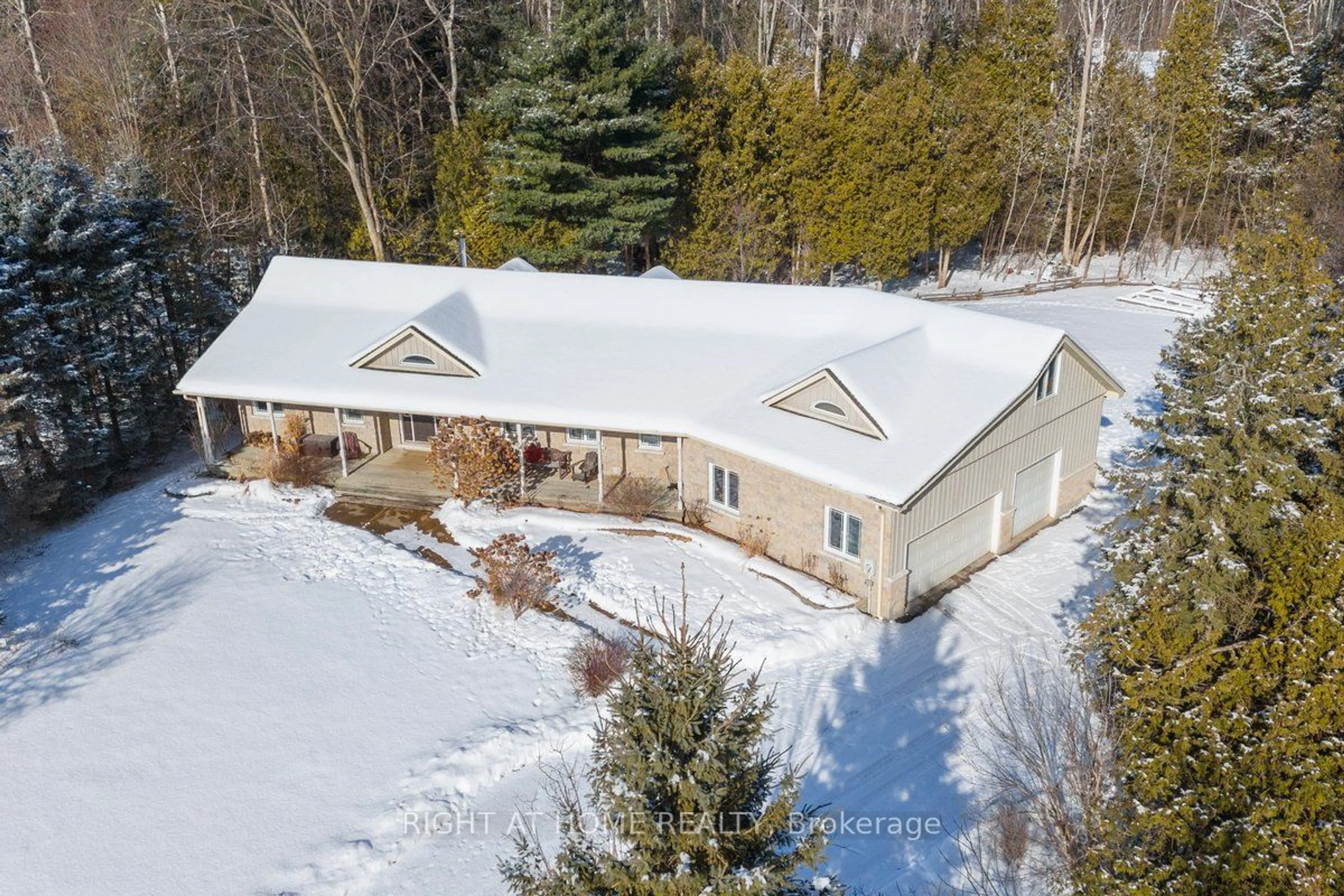 A pic from outside/outdoor area/front of a property/back of a property/a pic from drone, unknown for 47 Parr Blvd, Springwater Ontario L0M 1T2