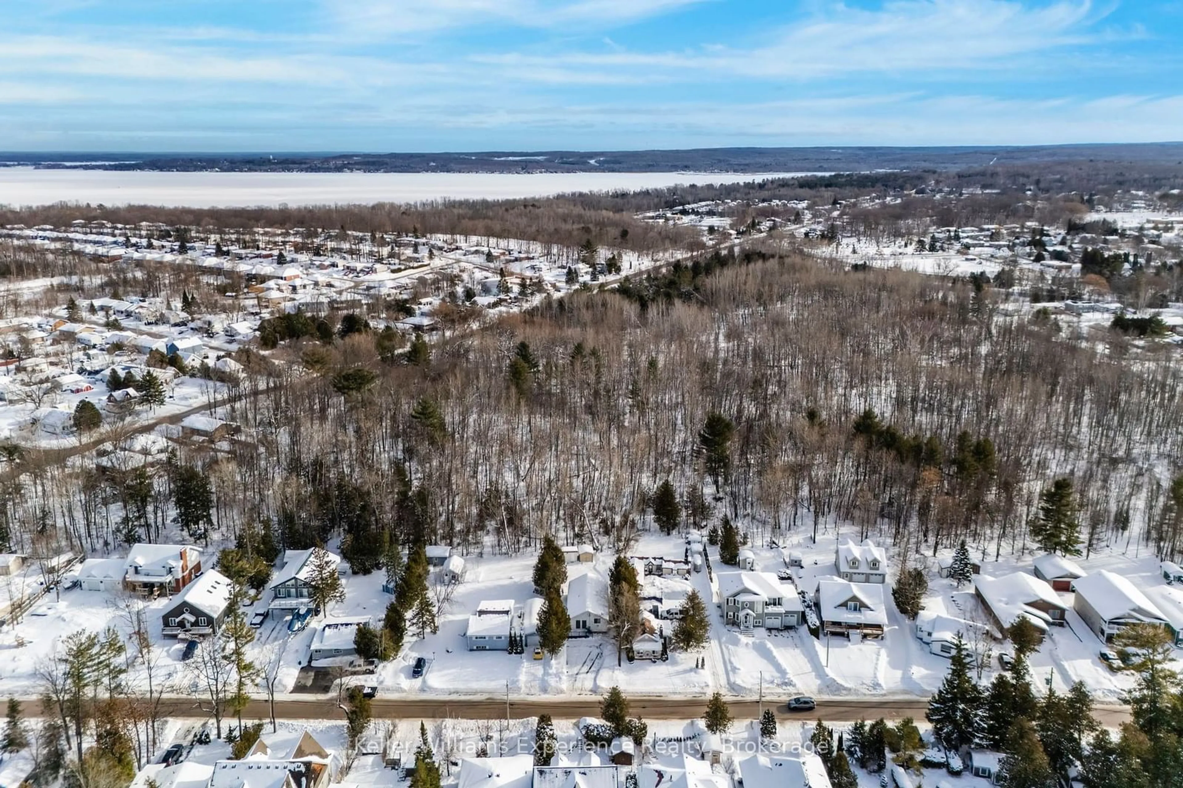 A pic from outside/outdoor area/front of a property/back of a property/a pic from drone, forest/trees view for 55 Hoyt Ave, Tay Ontario L0K 2A0