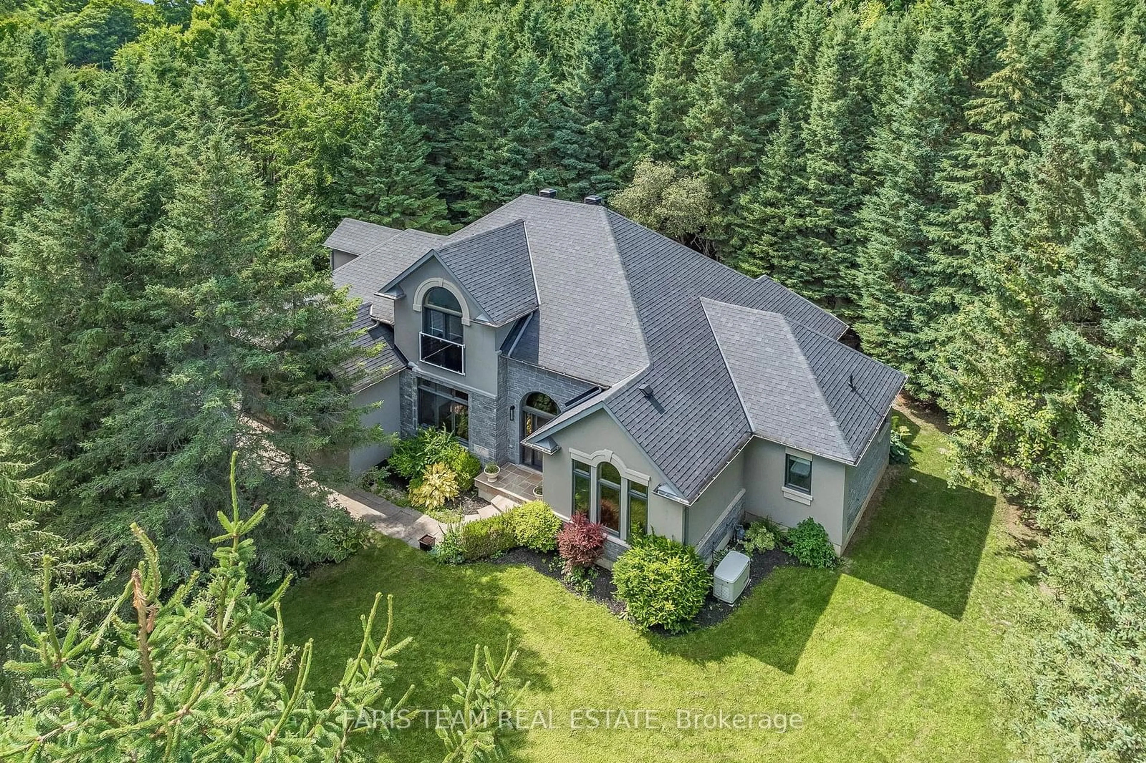 A pic from outside/outdoor area/front of a property/back of a property/a pic from drone, forest/trees view for 18 Red Oak Cres, Oro-Medonte Ontario L0L 2L0