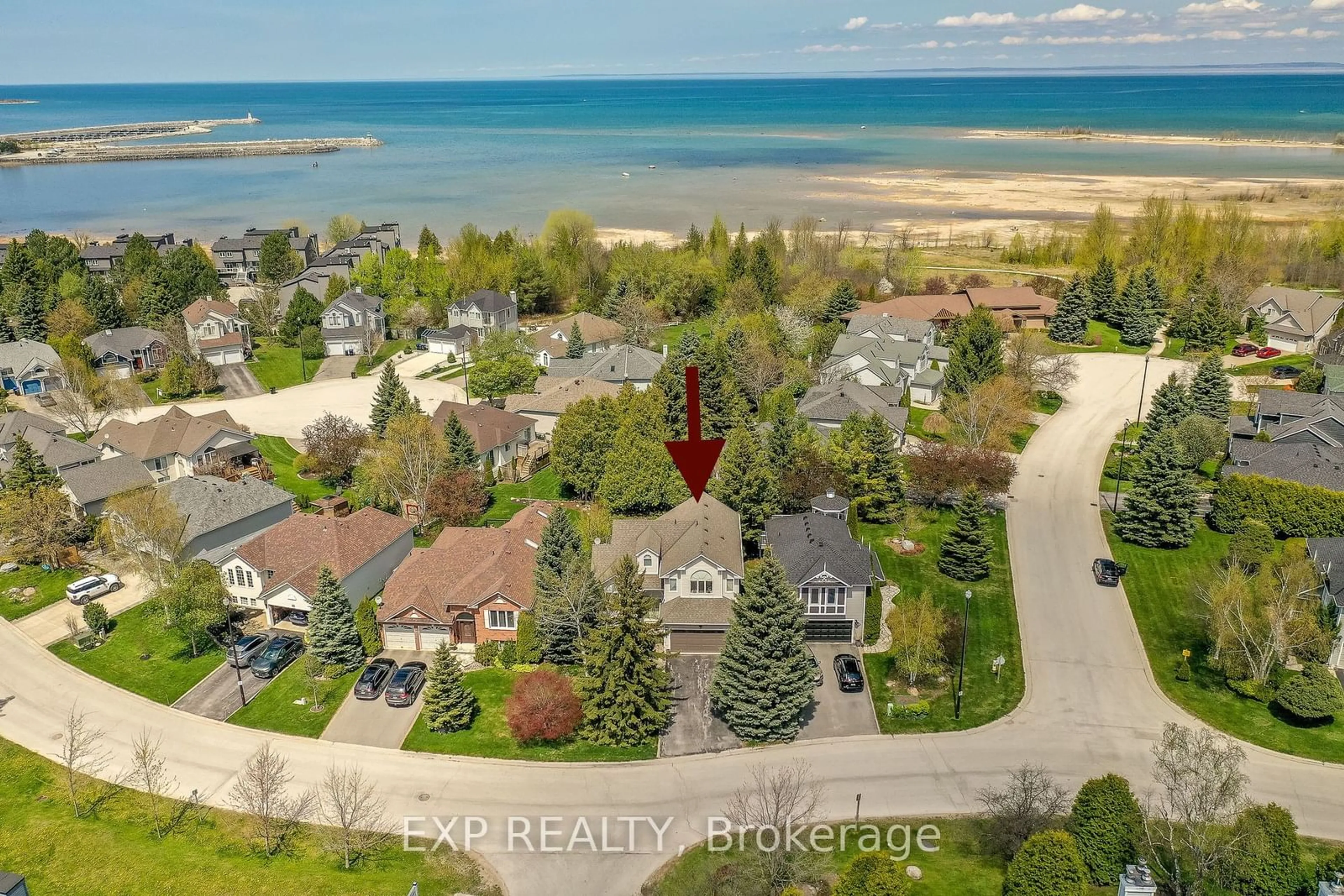 A pic from outside/outdoor area/front of a property/back of a property/a pic from drone, water/lake/river/ocean view for 56 Trott Blvd, Collingwood Ontario L9Y 5B6