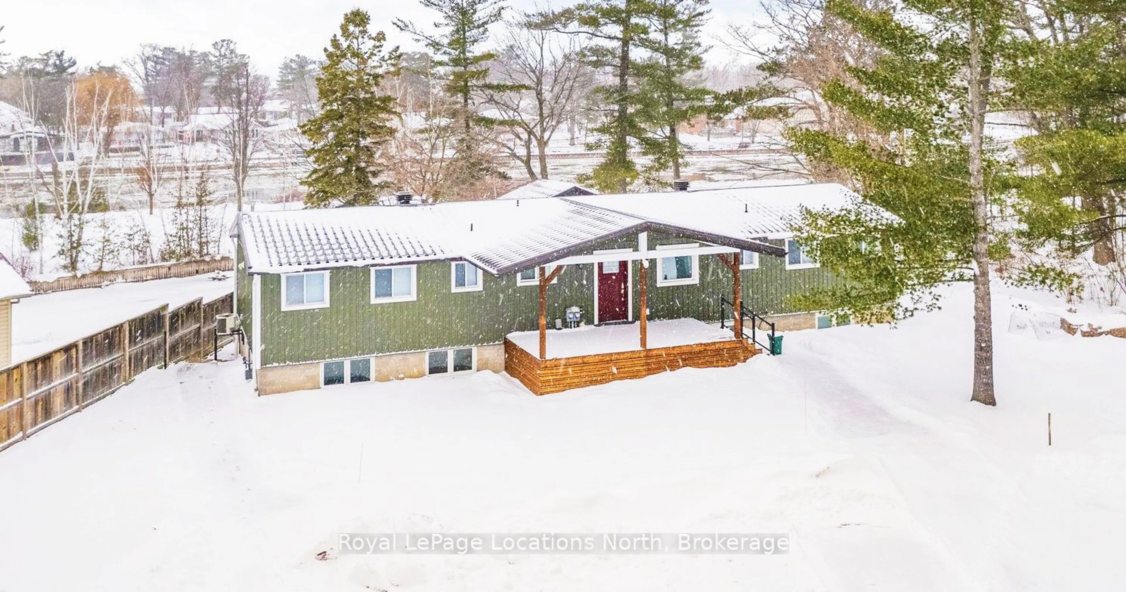 A pic from outside/outdoor area/front of a property/back of a property/a pic from drone, mountain view for 1628 River Rd, Wasaga Beach Ontario L9Z 2S3