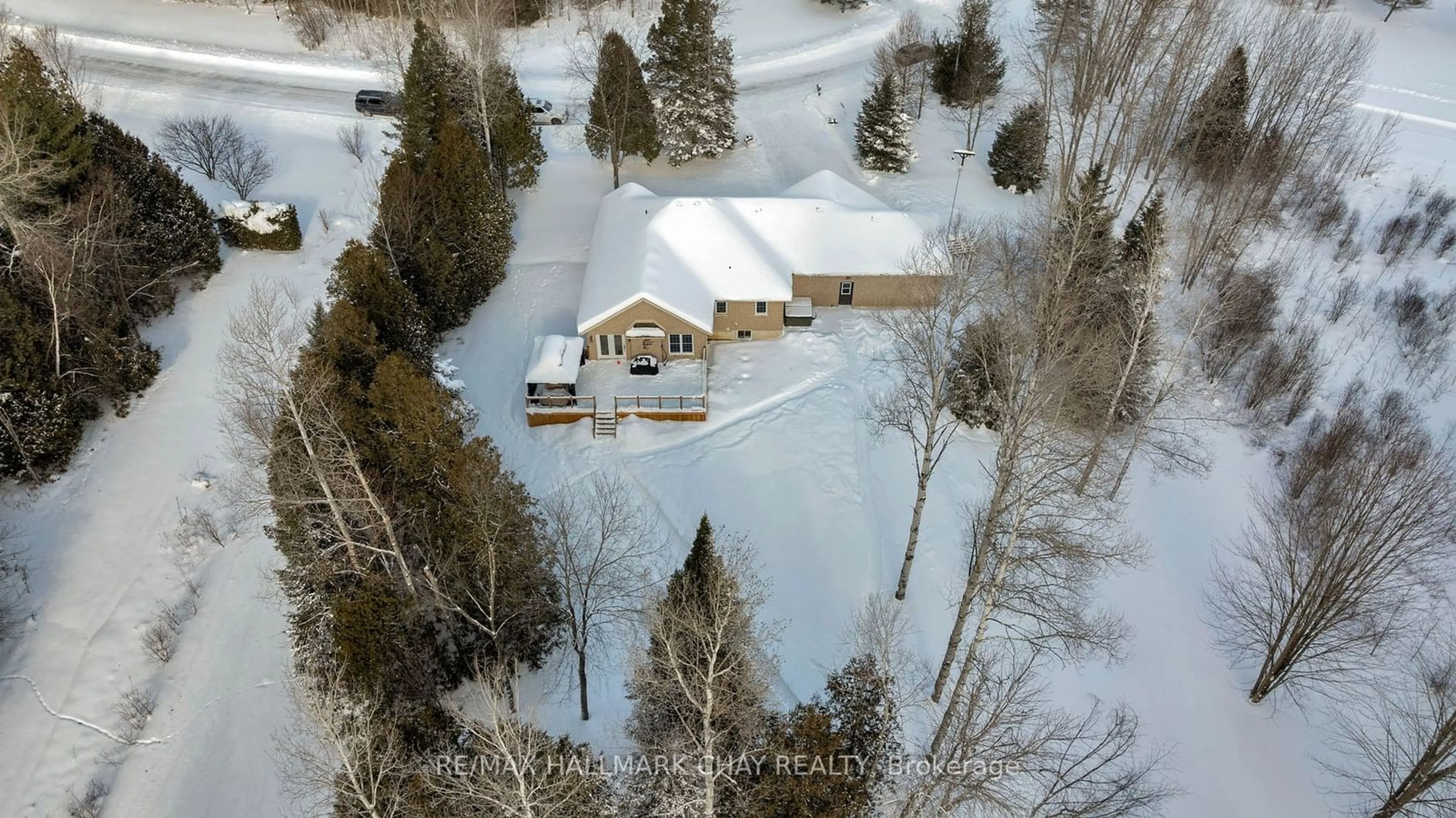 A pic from outside/outdoor area/front of a property/back of a property/a pic from drone, unknown for 12 Martinbrook Cres, Oro-Medonte Ontario L0L 2L0