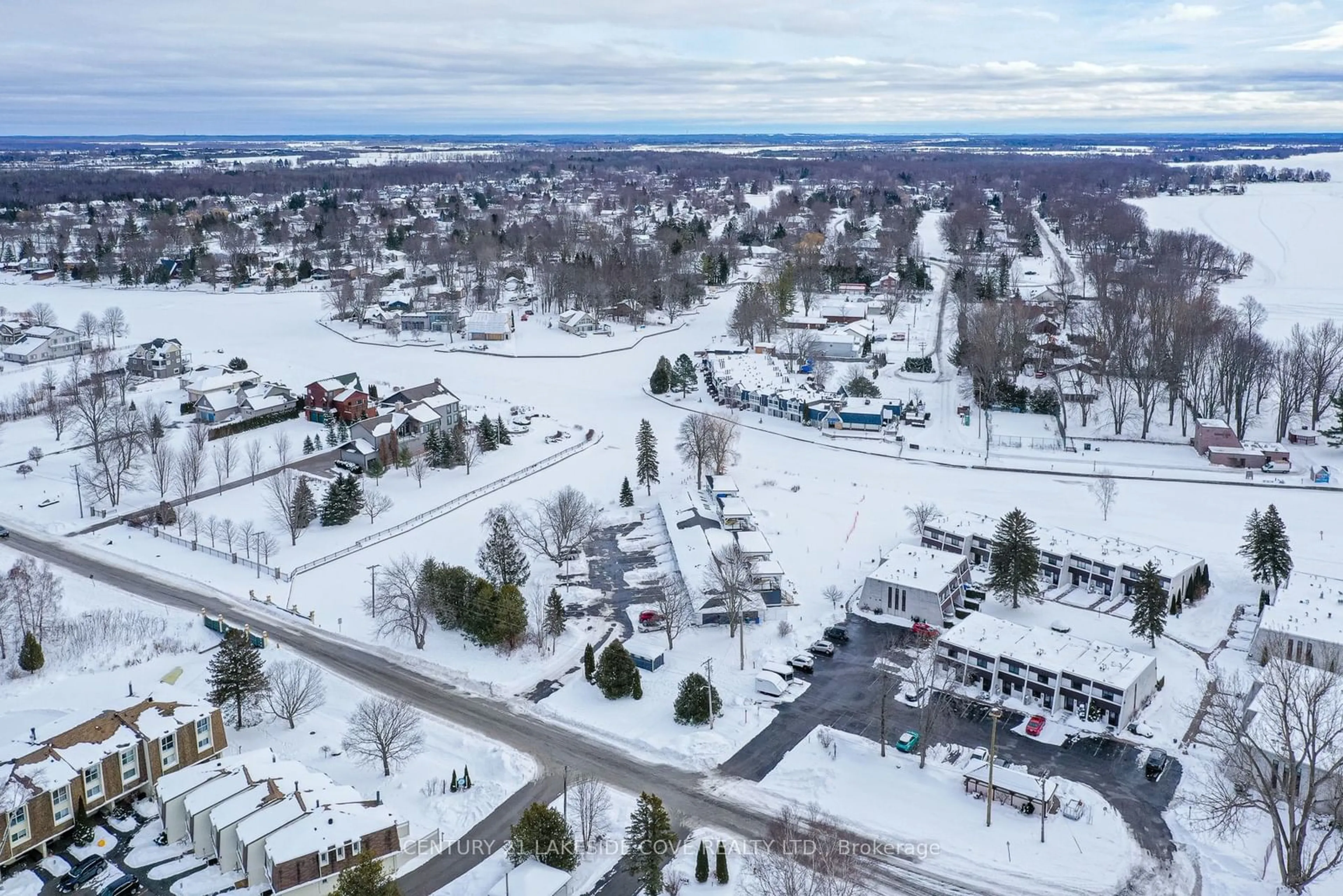 A pic from outside/outdoor area/front of a property/back of a property/a pic from drone, mountain view for 3 Paradise Blvd #Unit 2, Ramara Ontario L0K 1B0