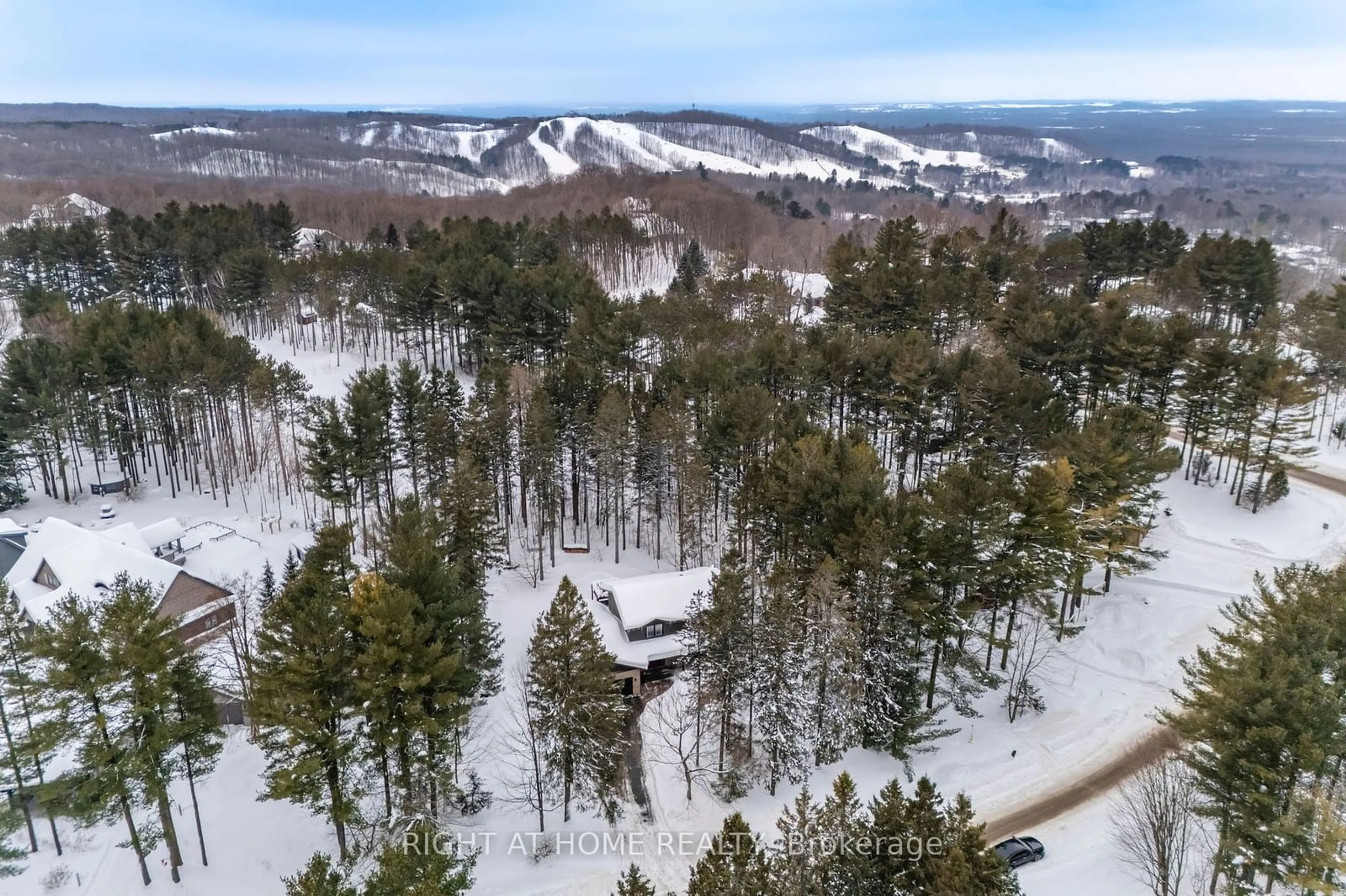 A pic from outside/outdoor area/front of a property/back of a property/a pic from drone, forest/trees view for 6 Fairway Crt, Oro-Medonte Ontario L0L 2L0