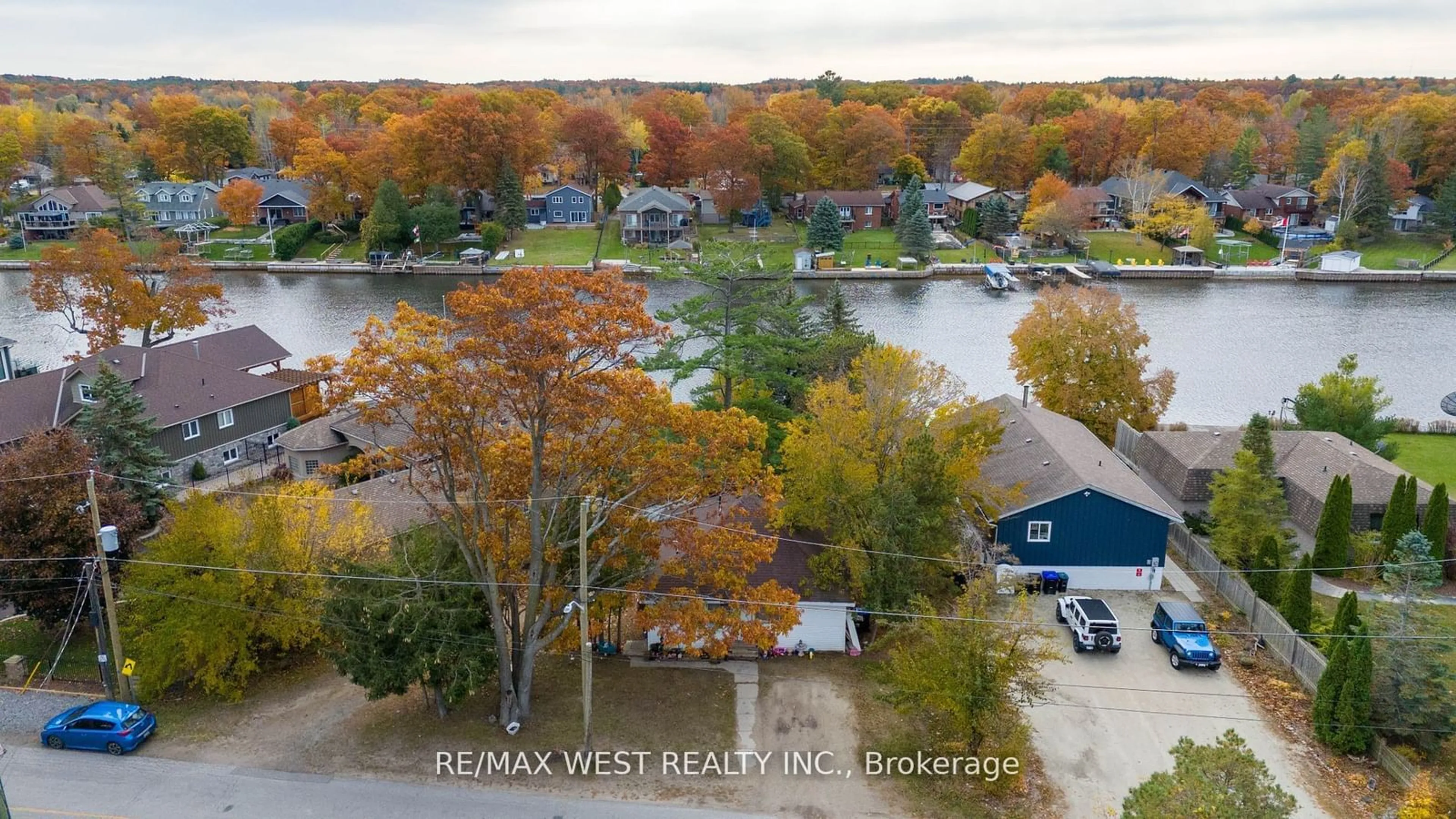 A pic from outside/outdoor area/front of a property/back of a property/a pic from drone, water/lake/river/ocean view for 75 Old Mosley St, Wasaga Beach Ontario L9Z 2X1