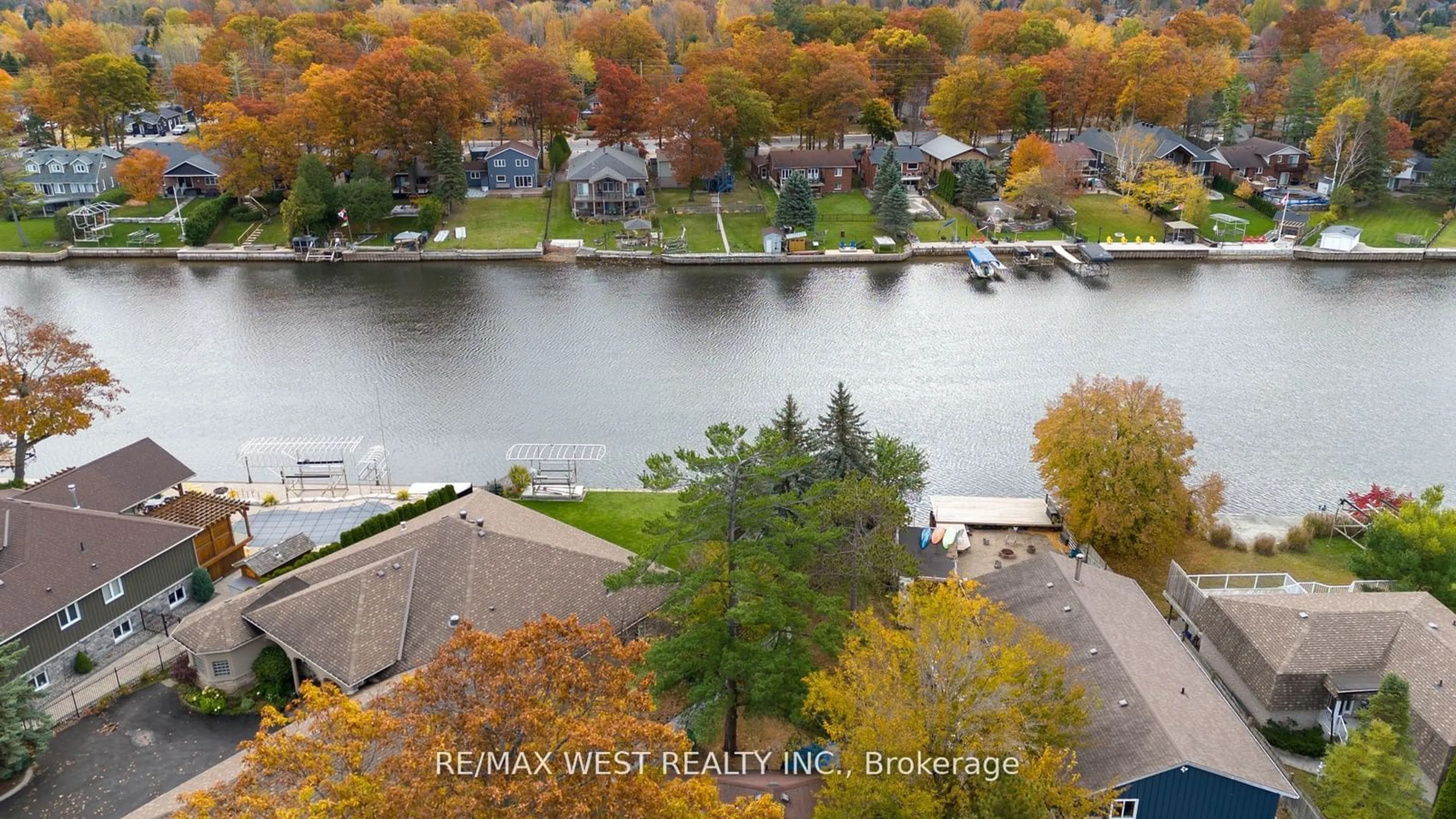 A pic from outside/outdoor area/front of a property/back of a property/a pic from drone, water/lake/river/ocean view for 75 Old Mosley St, Wasaga Beach Ontario L9Z 2X1