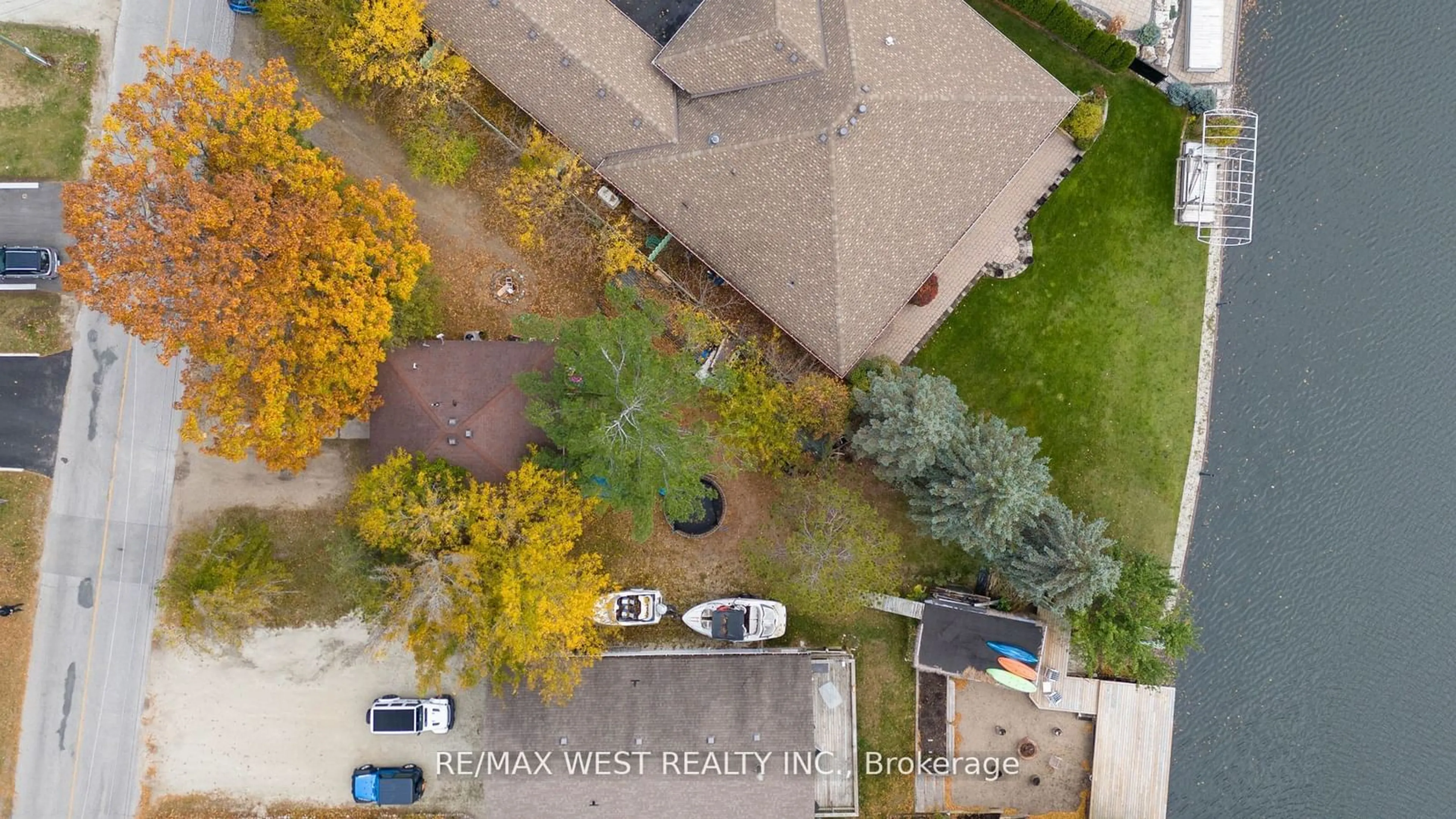 A pic from outside/outdoor area/front of a property/back of a property/a pic from drone, unknown for 75 Old Mosley St, Wasaga Beach Ontario L9Z 2X1