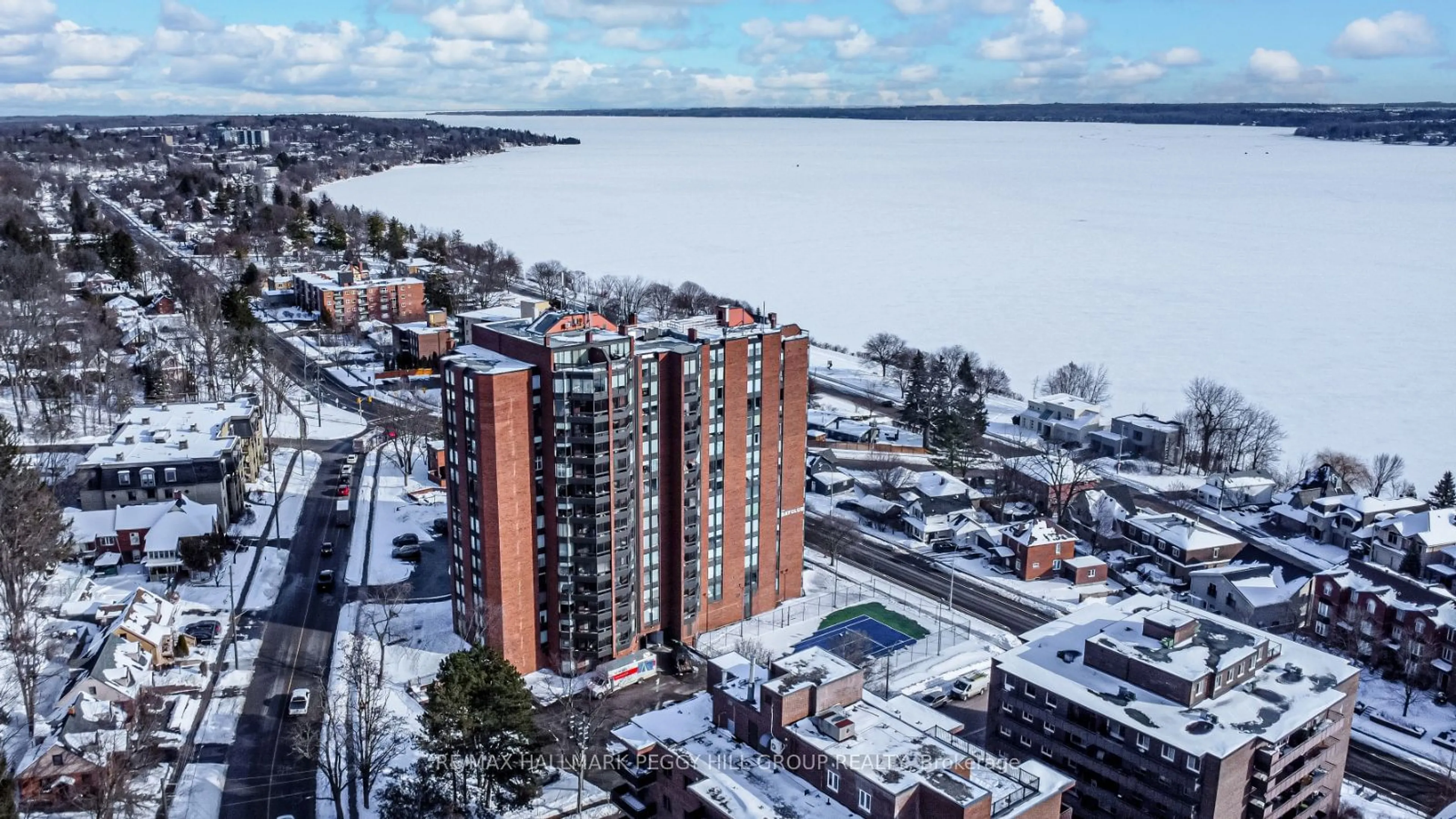 A pic from outside/outdoor area/front of a property/back of a property/a pic from drone, water/lake/river/ocean view for 181 Collier St #206, Barrie Ontario L4M 5L6