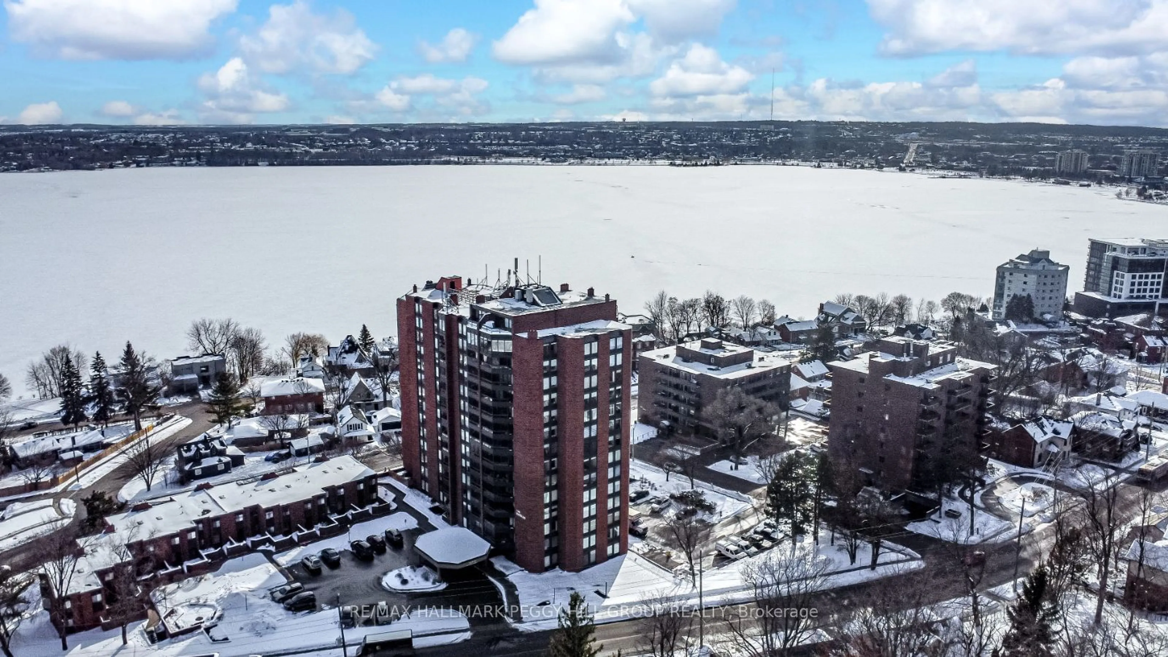 A pic from outside/outdoor area/front of a property/back of a property/a pic from drone, water/lake/river/ocean view for 181 Collier St #206, Barrie Ontario L4M 5L6