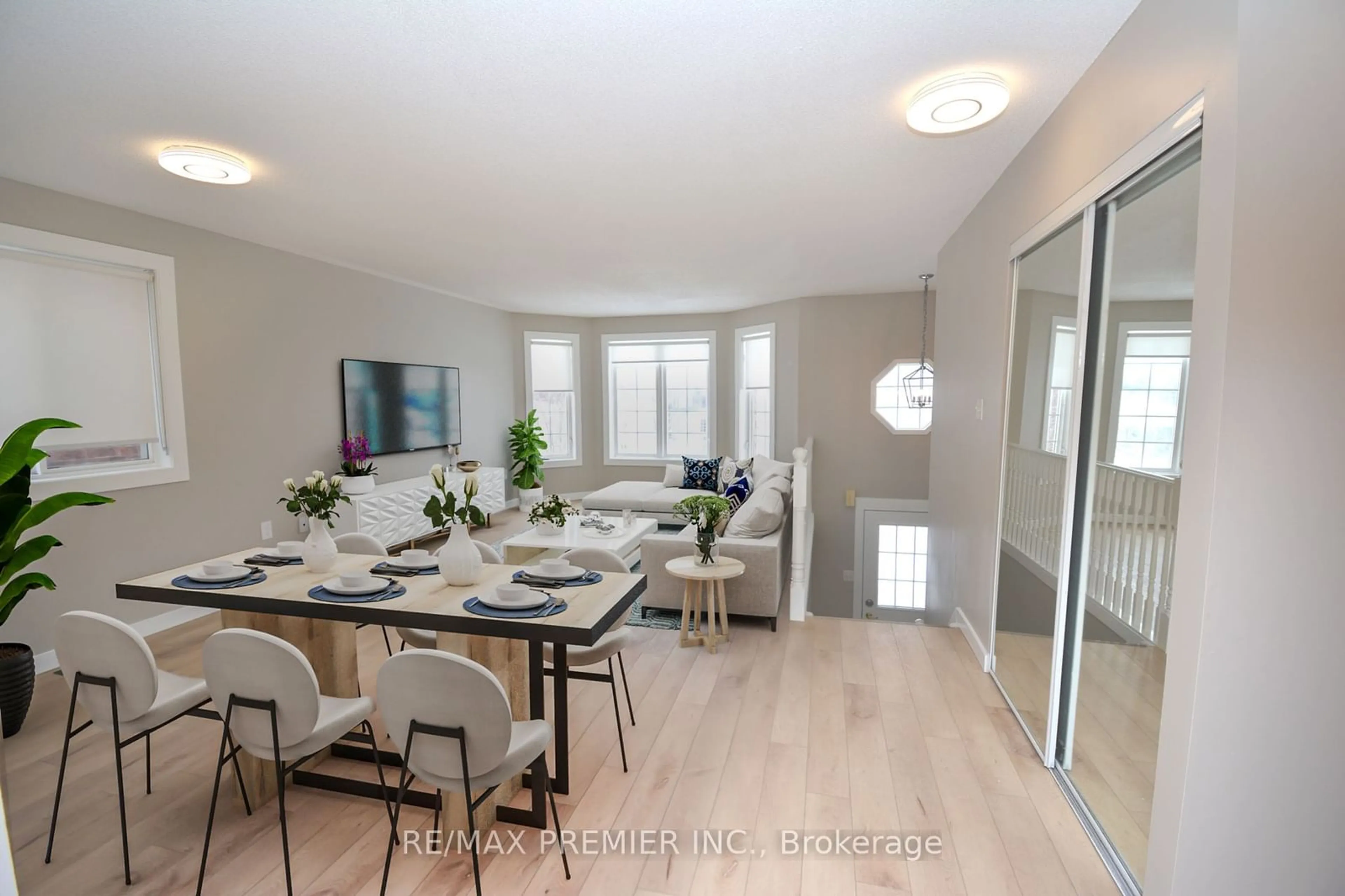 Dining room, wood/laminate floor for 16 Commonwealth Rd, Barrie Ontario L4M 7J6