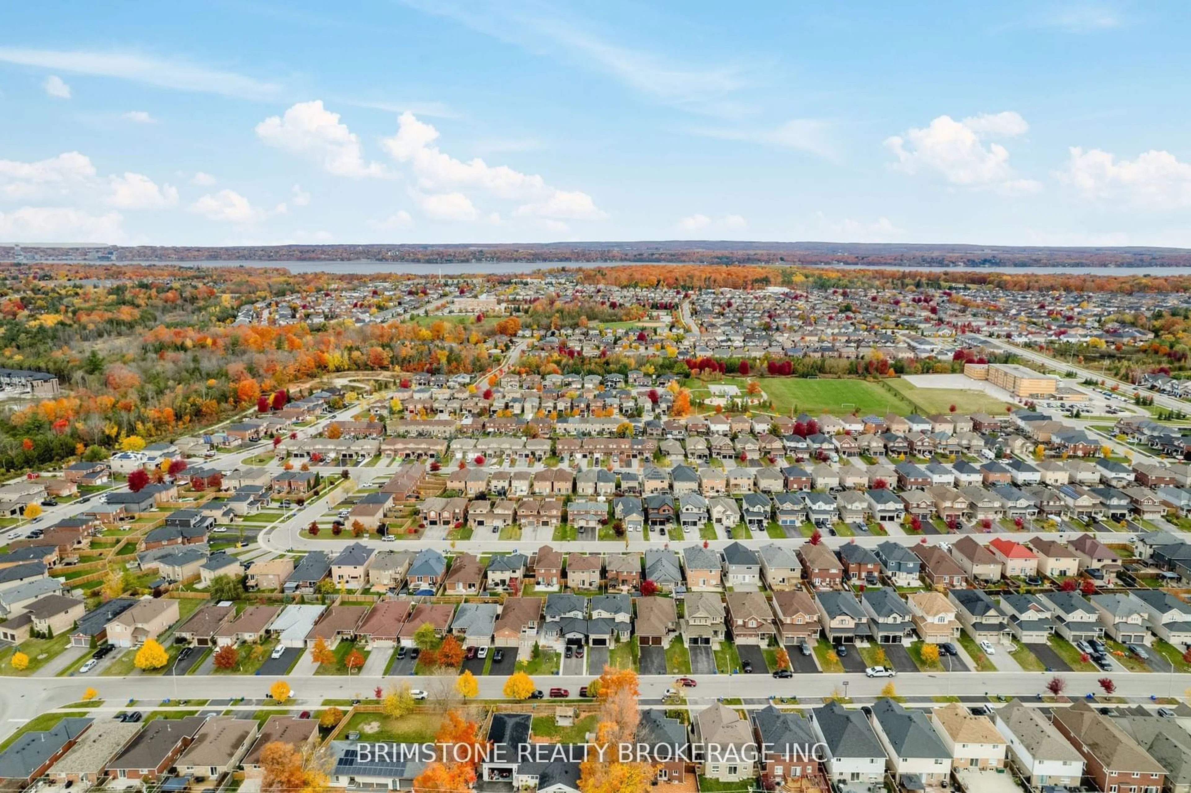 A pic from outside/outdoor area/front of a property/back of a property/a pic from drone, city buildings view from balcony for 95 Sun King Cres, Barrie Ontario L4M 7K4