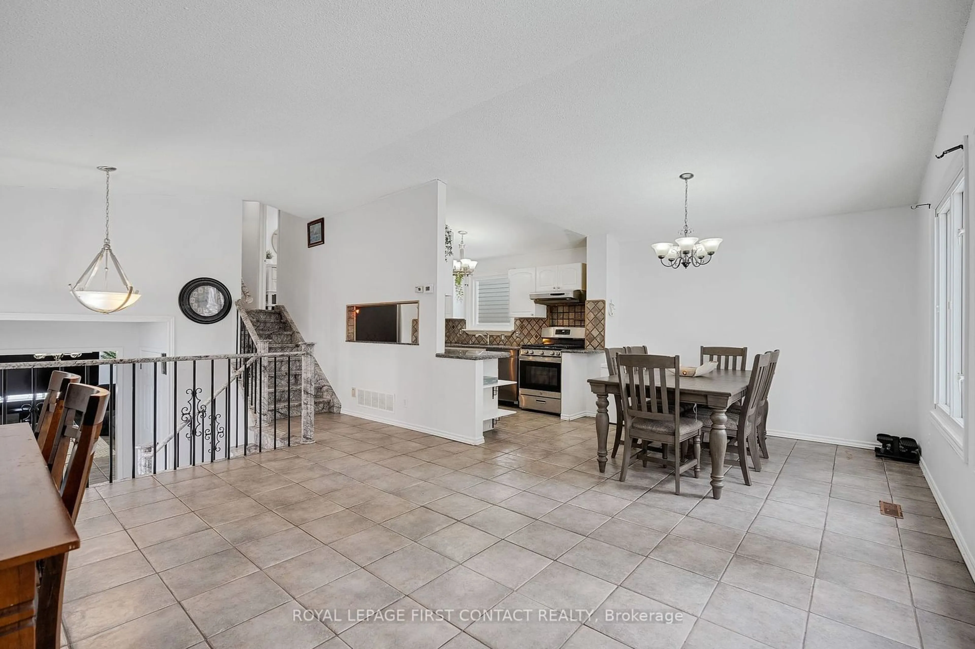 Open concept kitchen, ceramic/tile floor for 55 Rosenfeld Dr, Barrie Ontario L4M 5X5