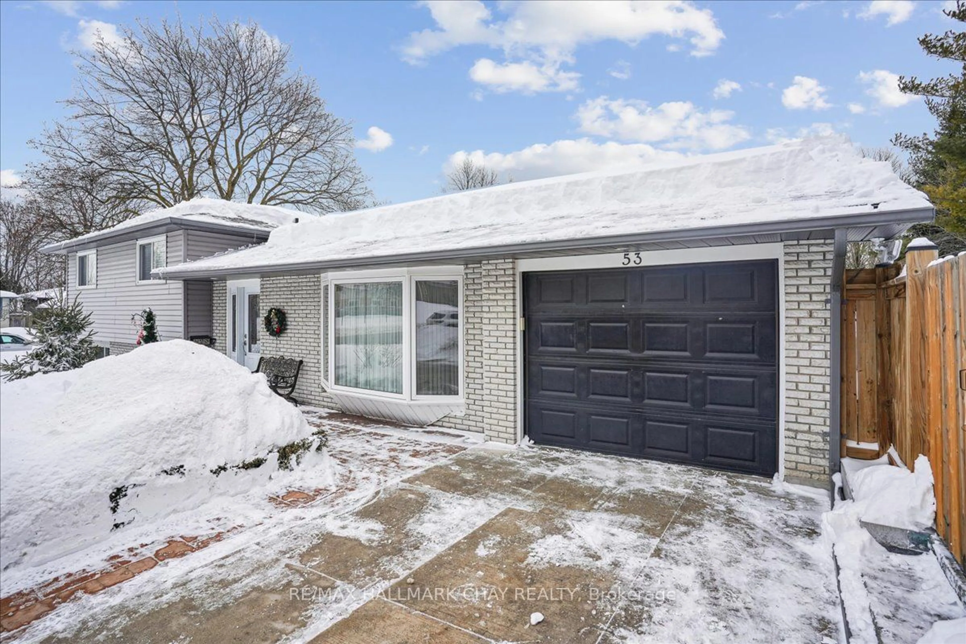 Home with brick exterior material, street for 53 Roslyn Rd, Barrie Ontario L4M 2X5