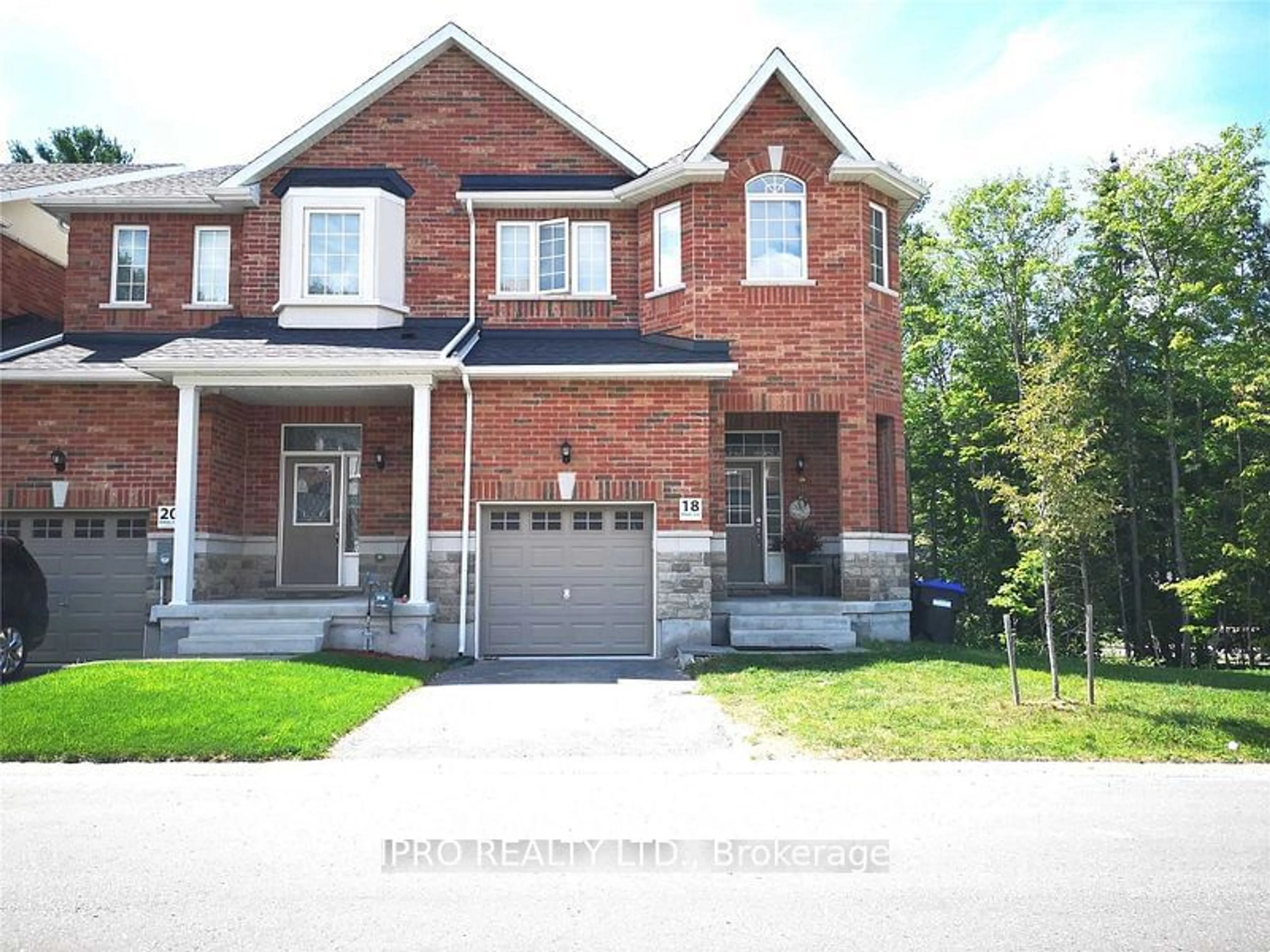 Home with brick exterior material, street for 18 Farwell Ave, Wasaga Beach Ontario L9Z 0H3