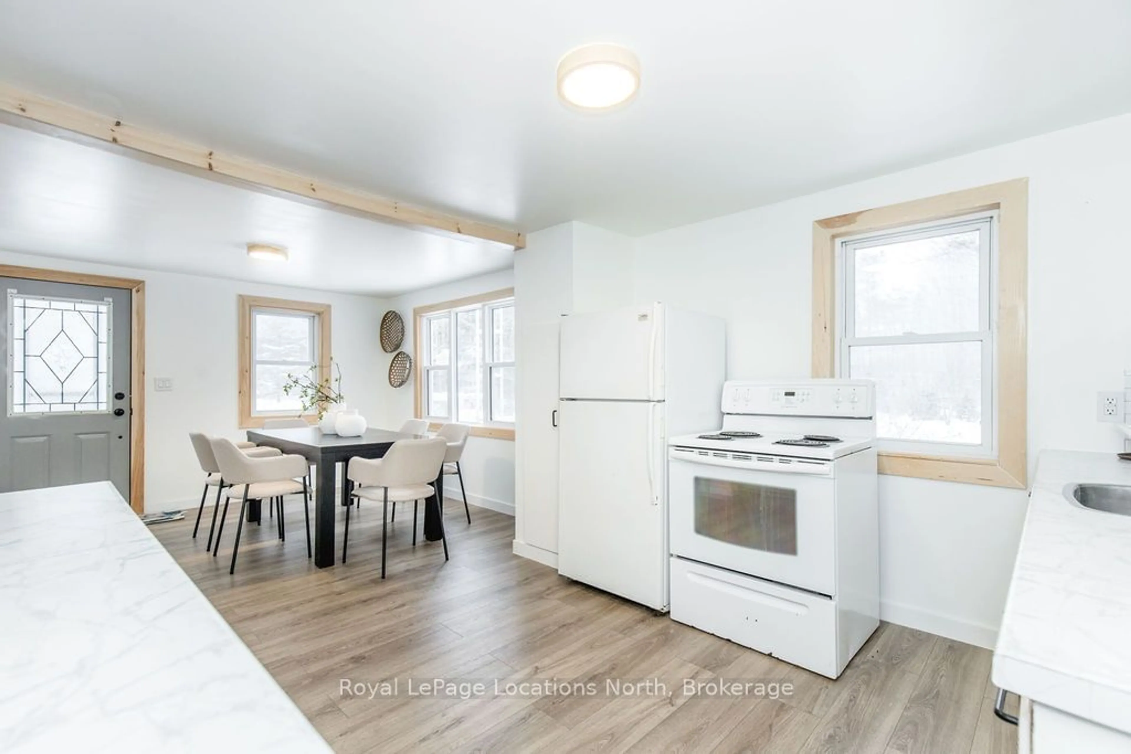 Open concept kitchen, wood/laminate floor for 80 Concession 8 Rd, Tiny Ontario L0L 2J0