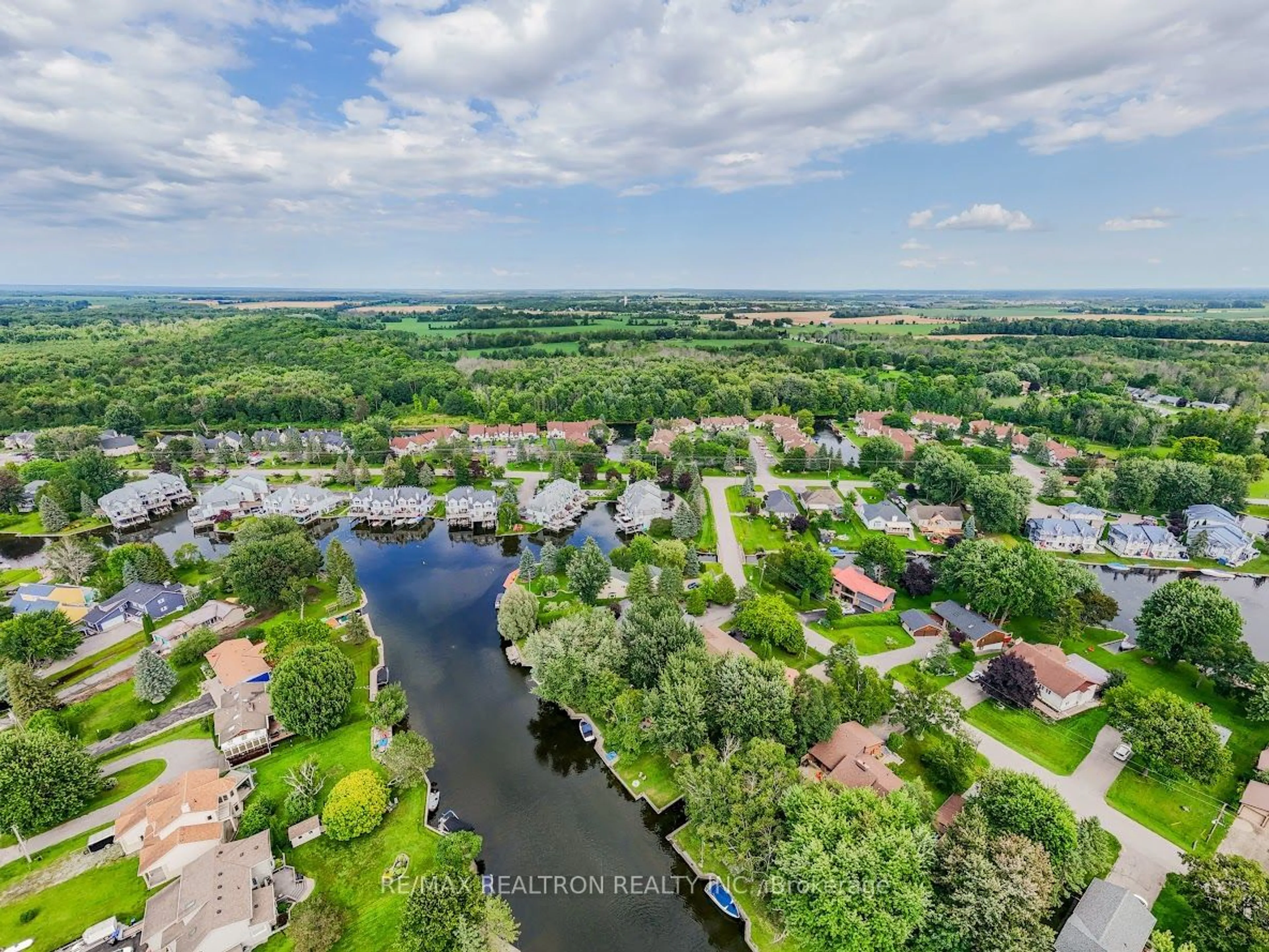 A pic from outside/outdoor area/front of a property/back of a property/a pic from drone, water/lake/river/ocean view for 24 Laguna Pkwy #7, Ramara Ontario L0K 1B0