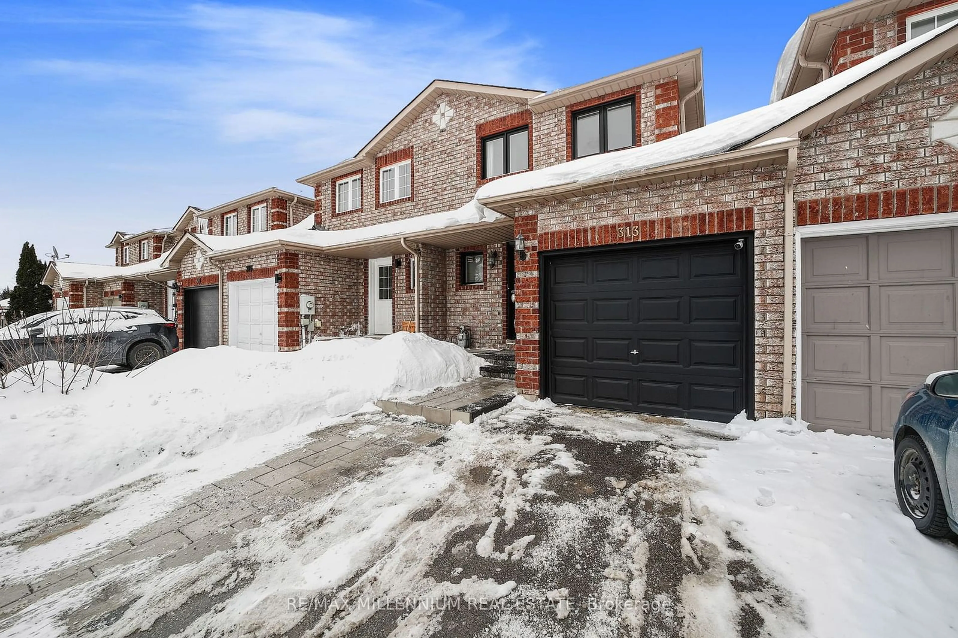 Home with brick exterior material, street for 313 Dunsmore Lane, Barrie Ontario L4M 7A8