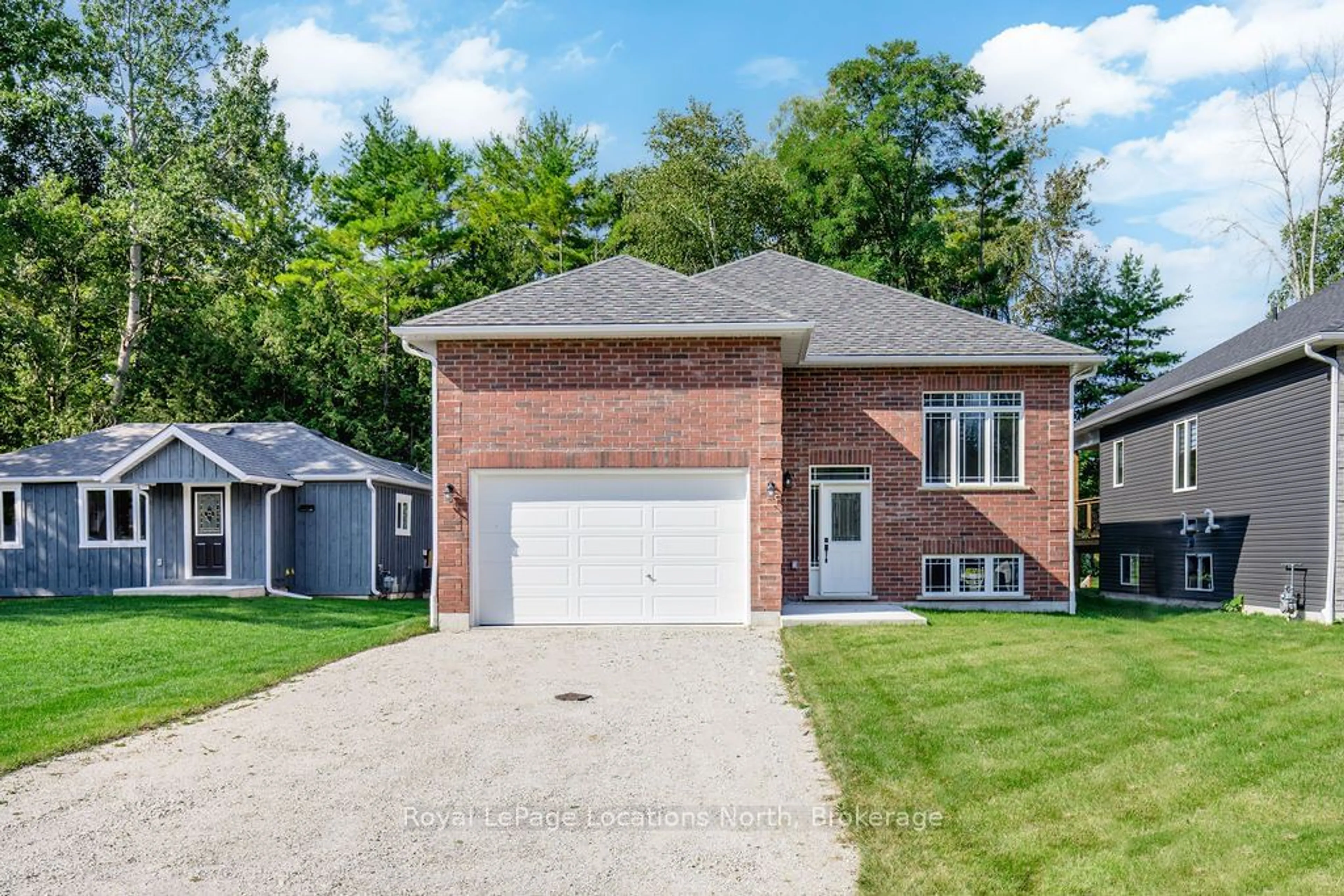 Home with brick exterior material, street for 14 56TH St, Wasaga Beach Ontario L9Z 1W5