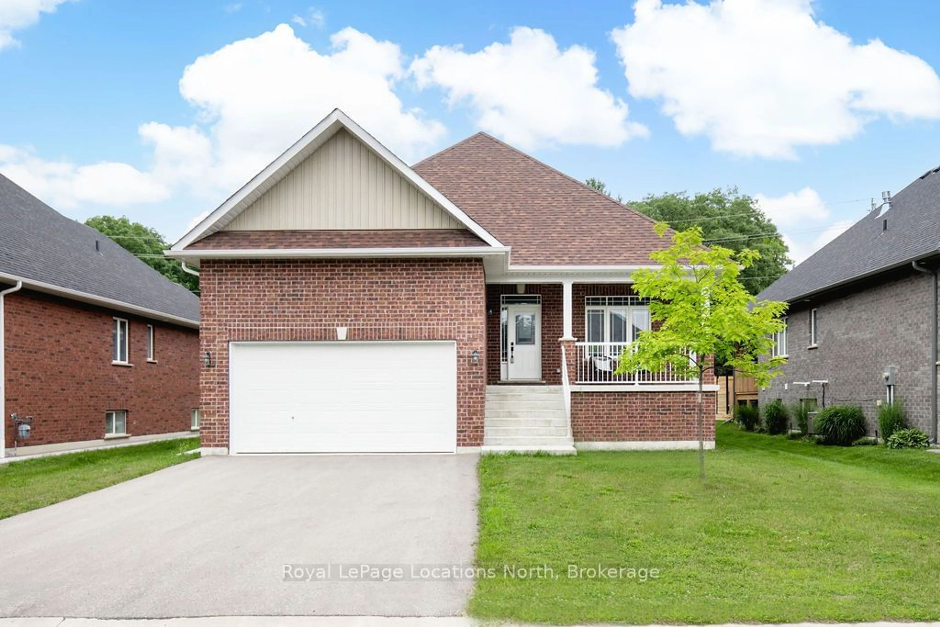 Home with brick exterior material, street for 12 NATURES Tr, Wasaga Beach Ontario L9Z 0H4