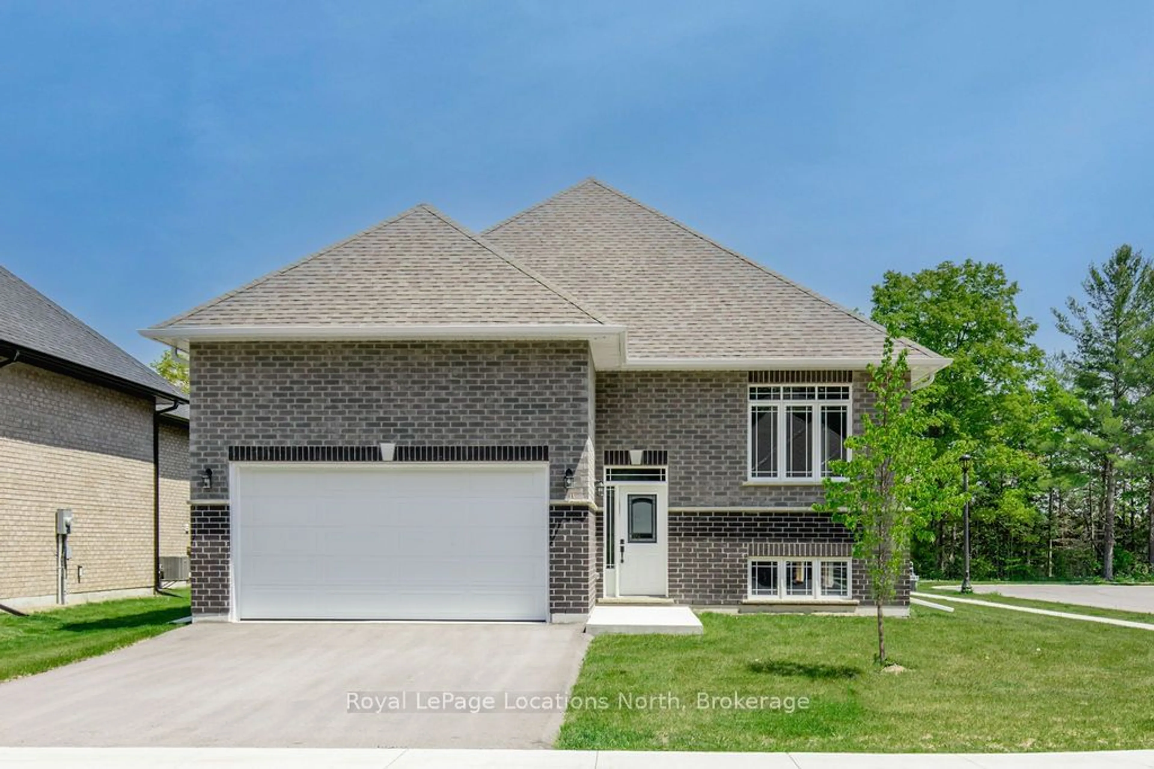 Home with brick exterior material, street for 51 NATURES Tr, Wasaga Beach Ontario L9Z 0H4