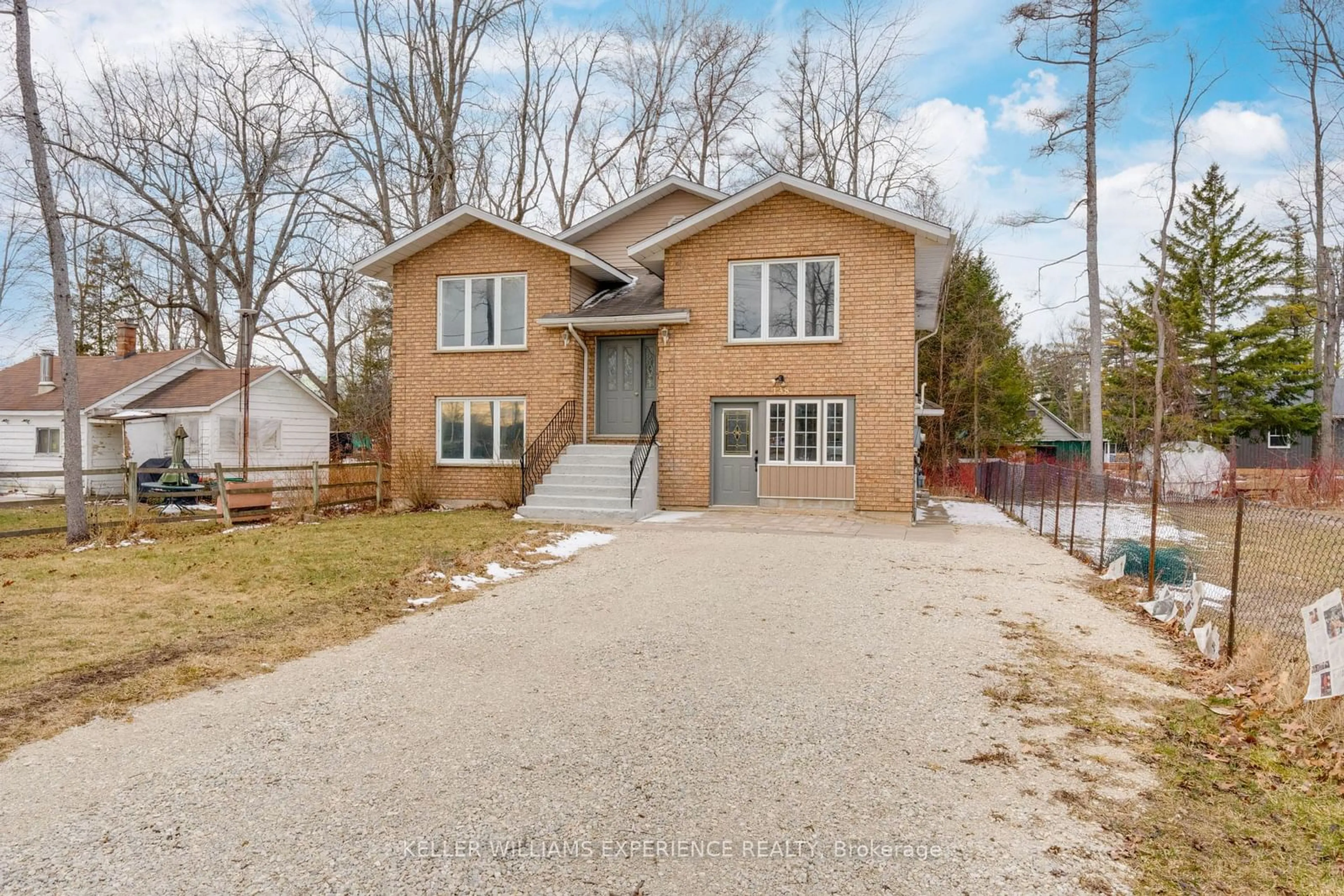 Home with brick exterior material, street for 138 45th St, Wasaga Beach Ontario L9Z 1Z2