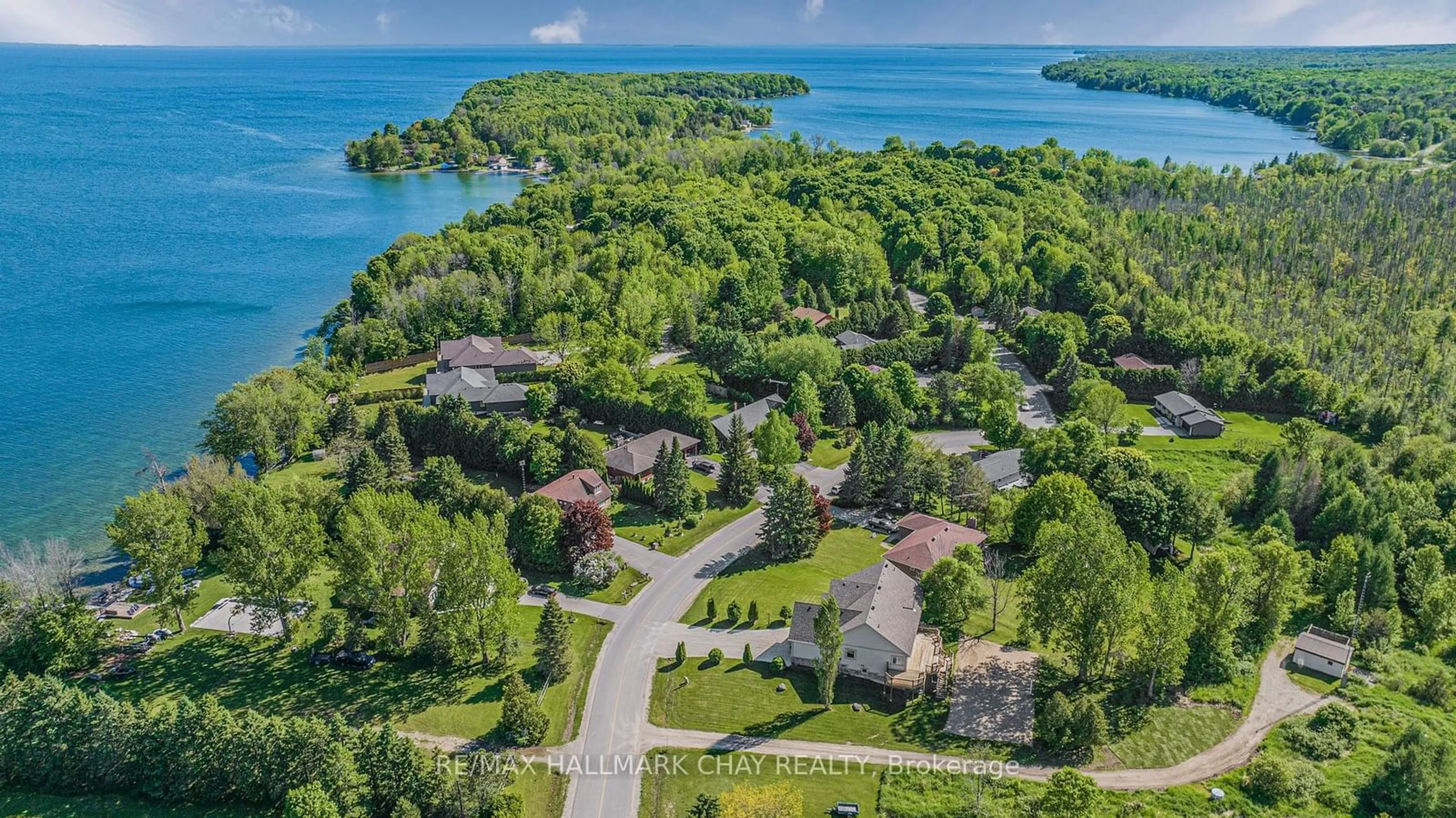 A pic from outside/outdoor area/front of a property/back of a property/a pic from drone, water/lake/river/ocean view for 42 Maplewood Pkwy, Oro-Medonte Ontario L3V 6H1