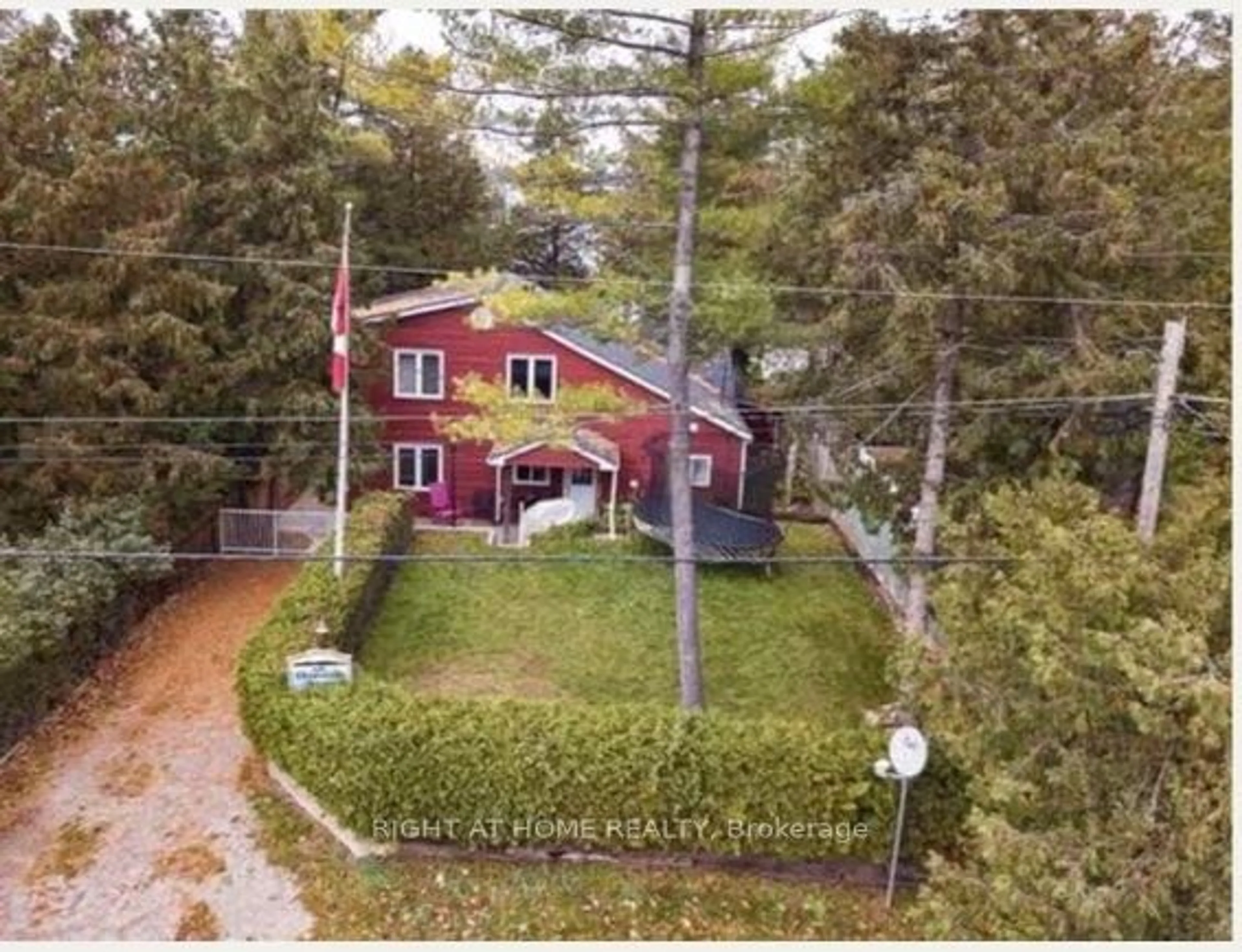 A pic from outside/outdoor area/front of a property/back of a property/a pic from drone, street for 1136 Sylvan Glen Dr, Ramara Ontario L0K 1B0