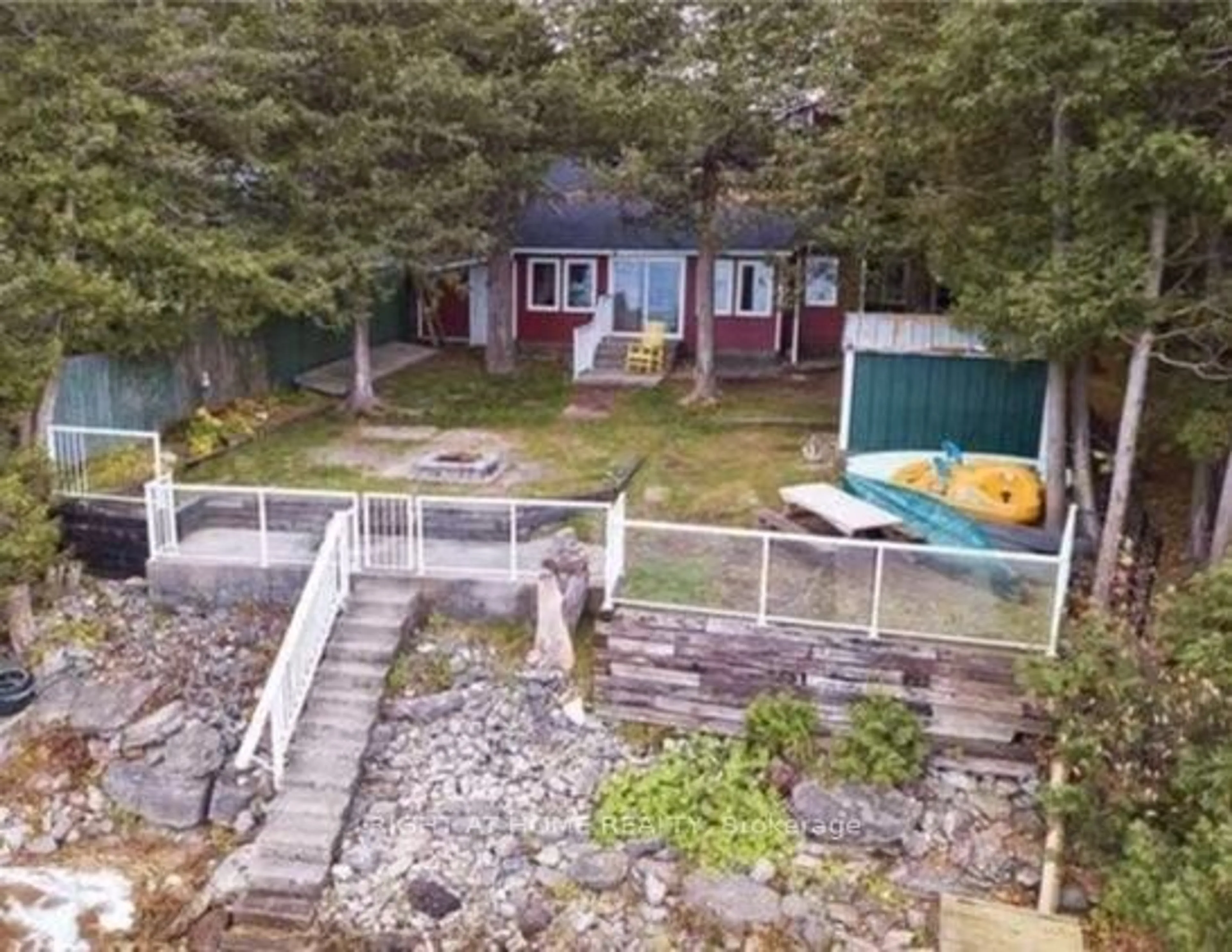 A pic from outside/outdoor area/front of a property/back of a property/a pic from drone, water/lake/river/ocean view for 1136 Sylvan Glen Dr, Ramara Ontario L0K 1B0