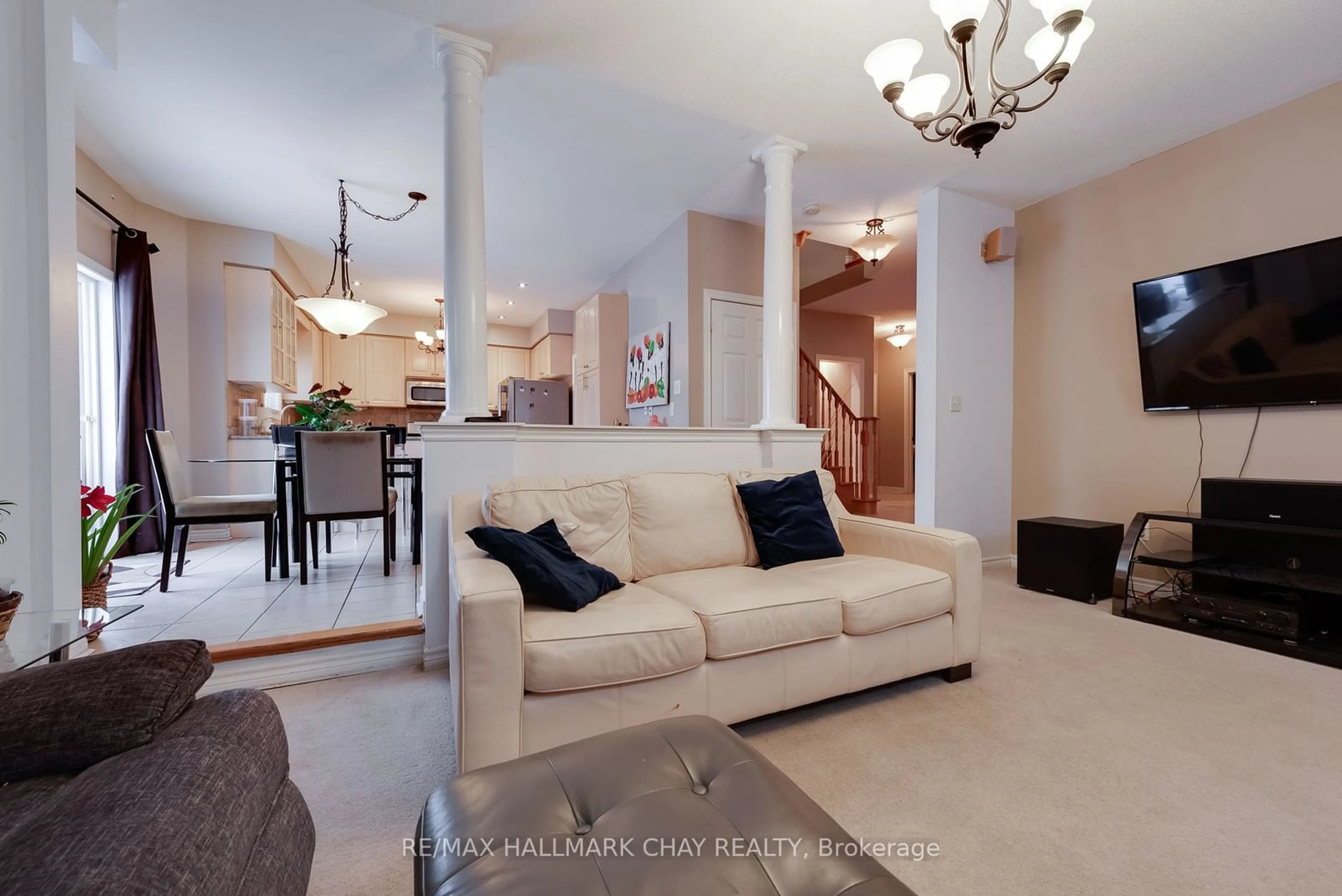 Living room with furniture, ceramic/tile floor for 11 Springwood Crt, Barrie Ontario L4N 5V1