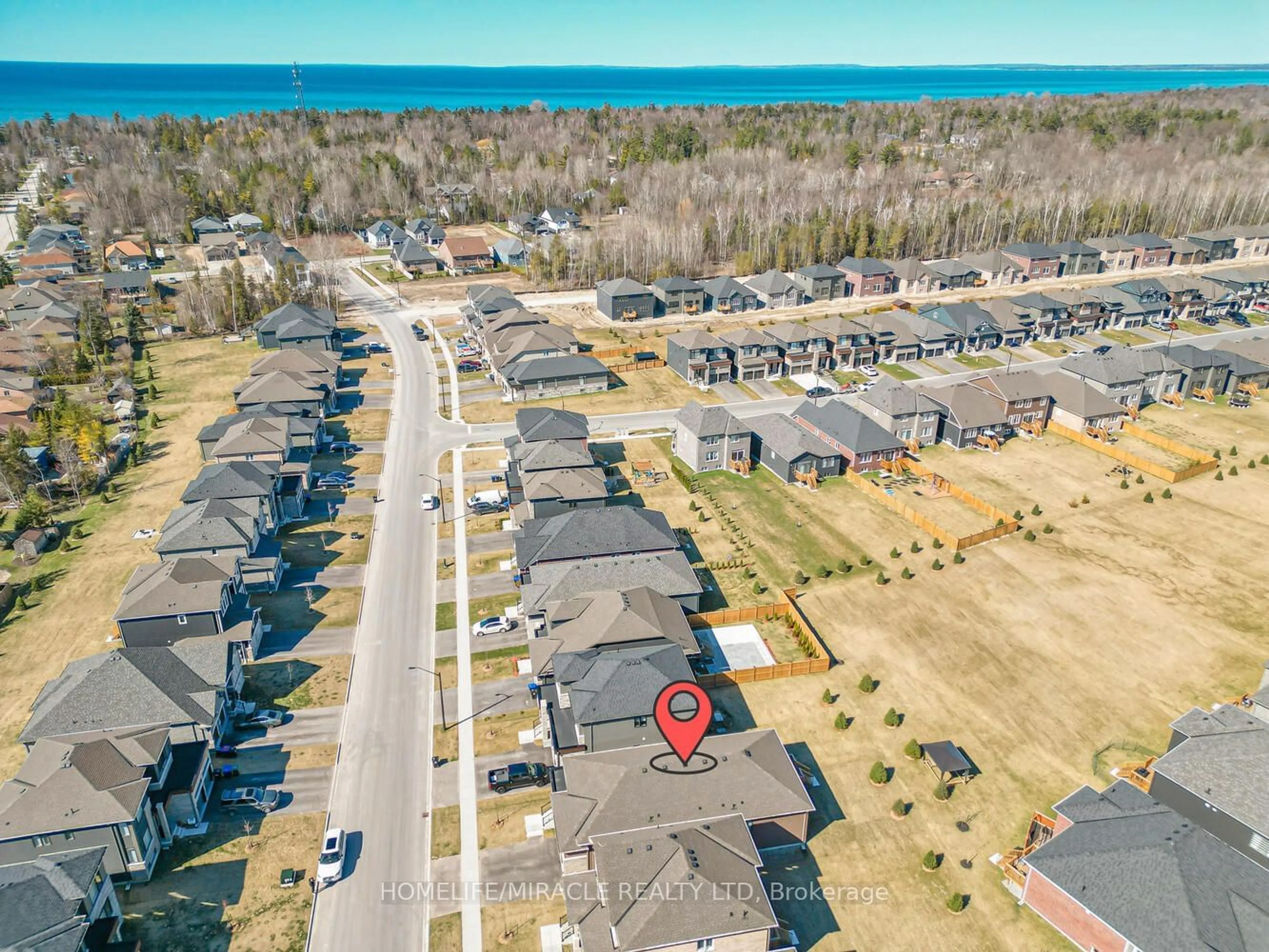 A pic from outside/outdoor area/front of a property/back of a property/a pic from drone, water/lake/river/ocean view for 8 Beatrice Dr, Wasaga Beach Ontario L9Z 1A5