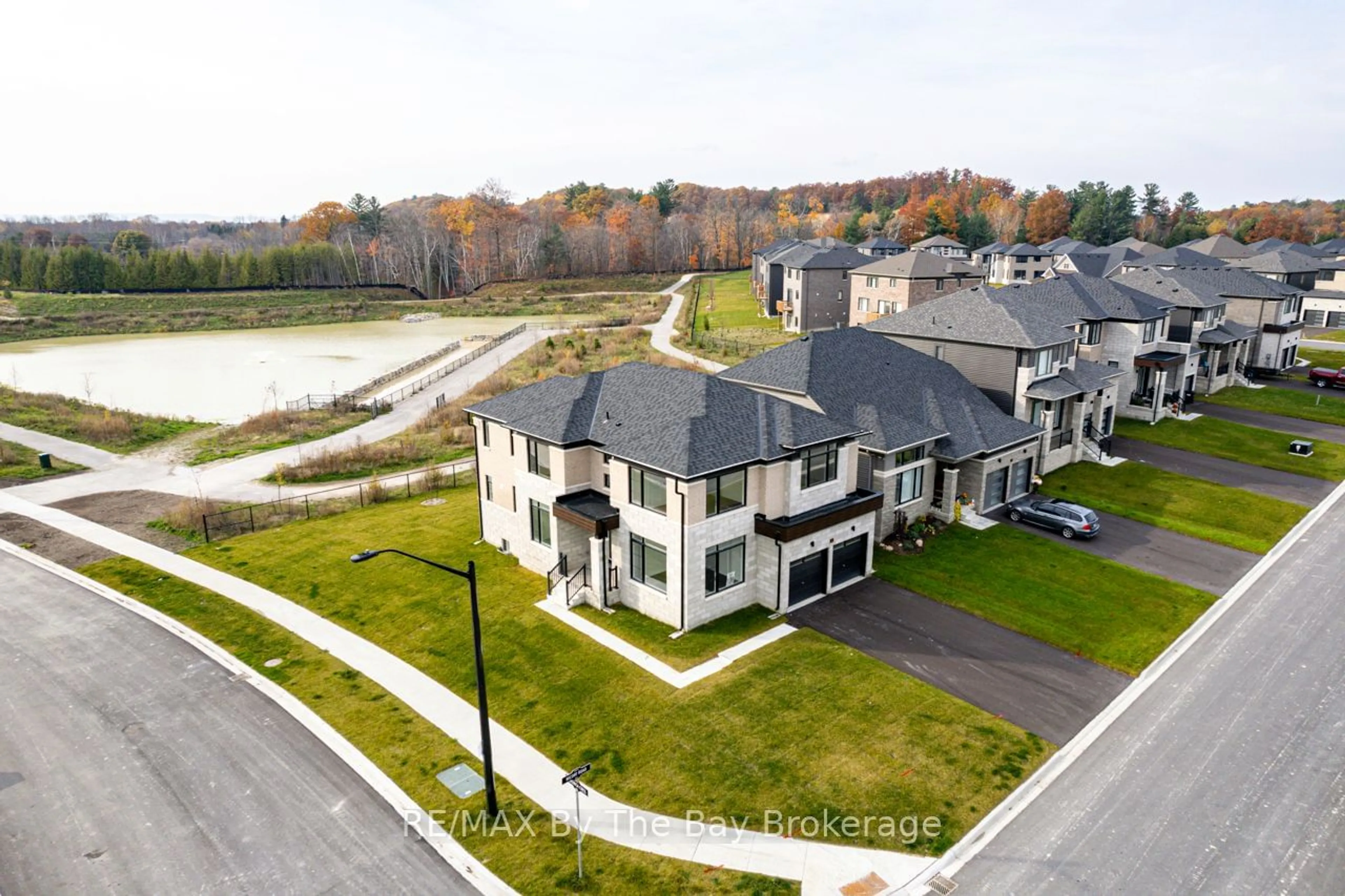 A pic from outside/outdoor area/front of a property/back of a property/a pic from drone, water/lake/river/ocean view for 31 Nicort Rd, Wasaga Beach Ontario L9Z 0N8