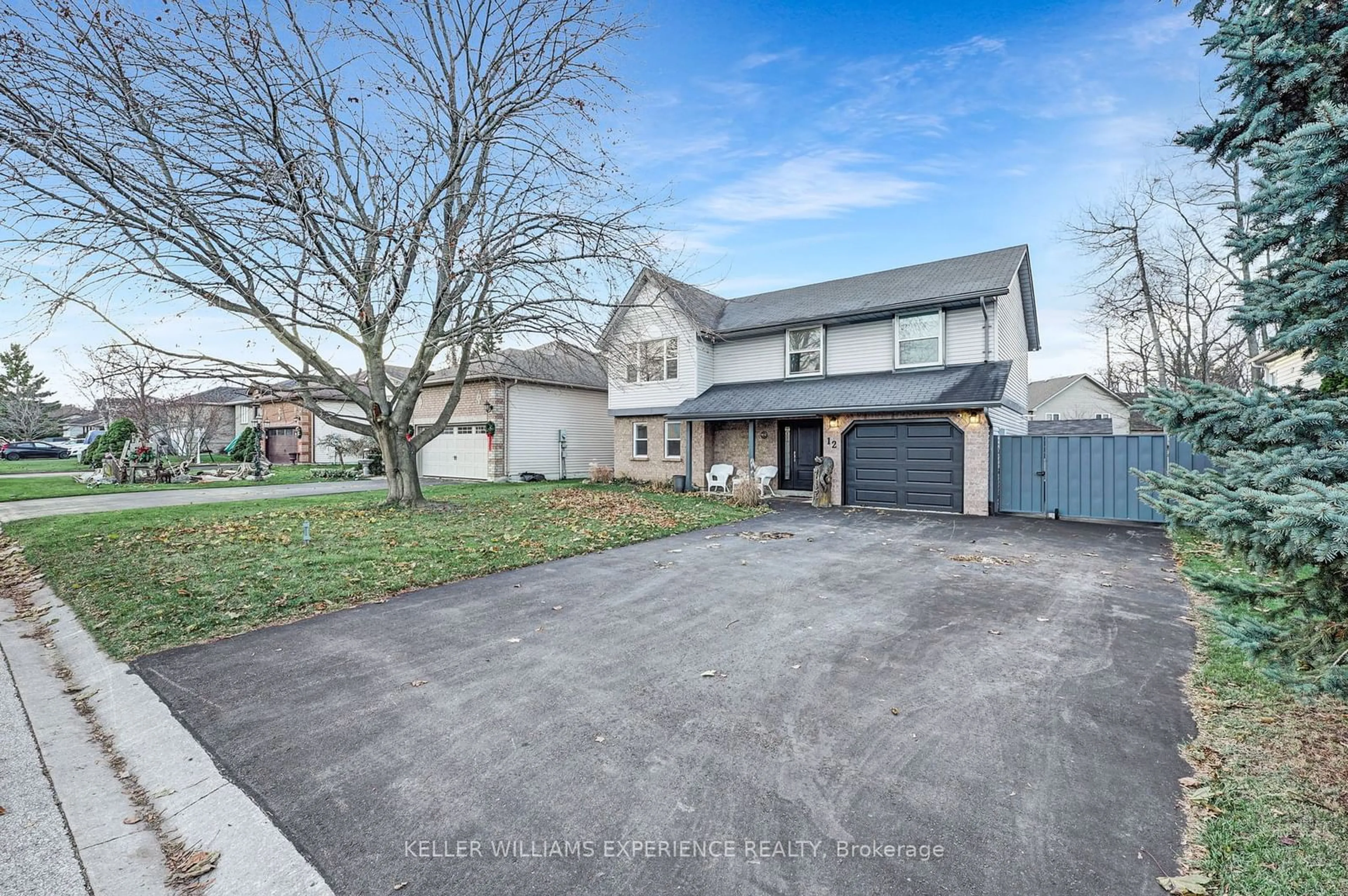 A pic from outside/outdoor area/front of a property/back of a property/a pic from drone, street for 12 Riverdale Dr, Wasaga Beach Ontario L9Z 1E9