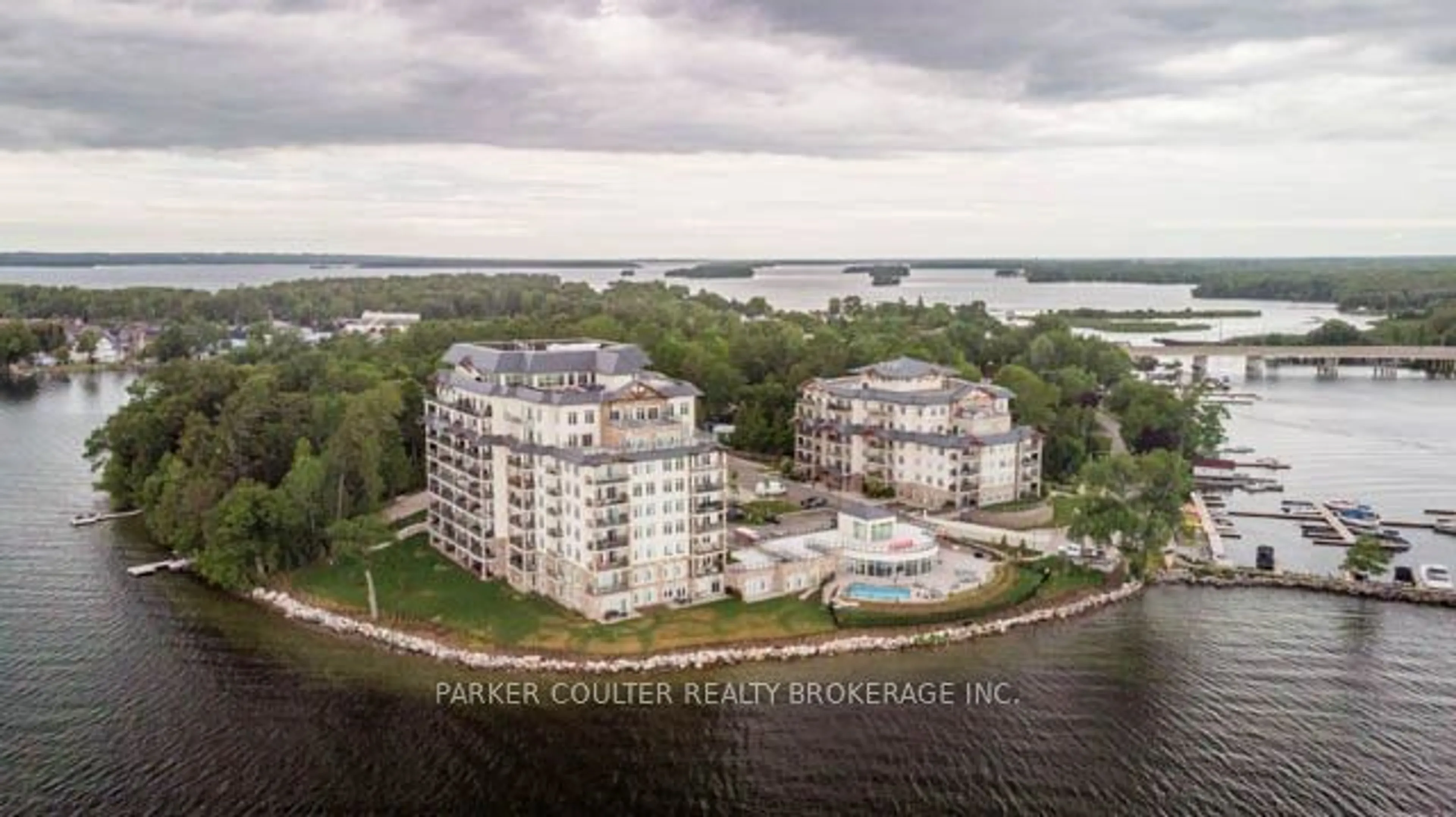 A pic from outside/outdoor area/front of a property/back of a property/a pic from drone, water/lake/river/ocean view for 90 Orchard Point Rd #105, Orillia Ontario L3V 8K4