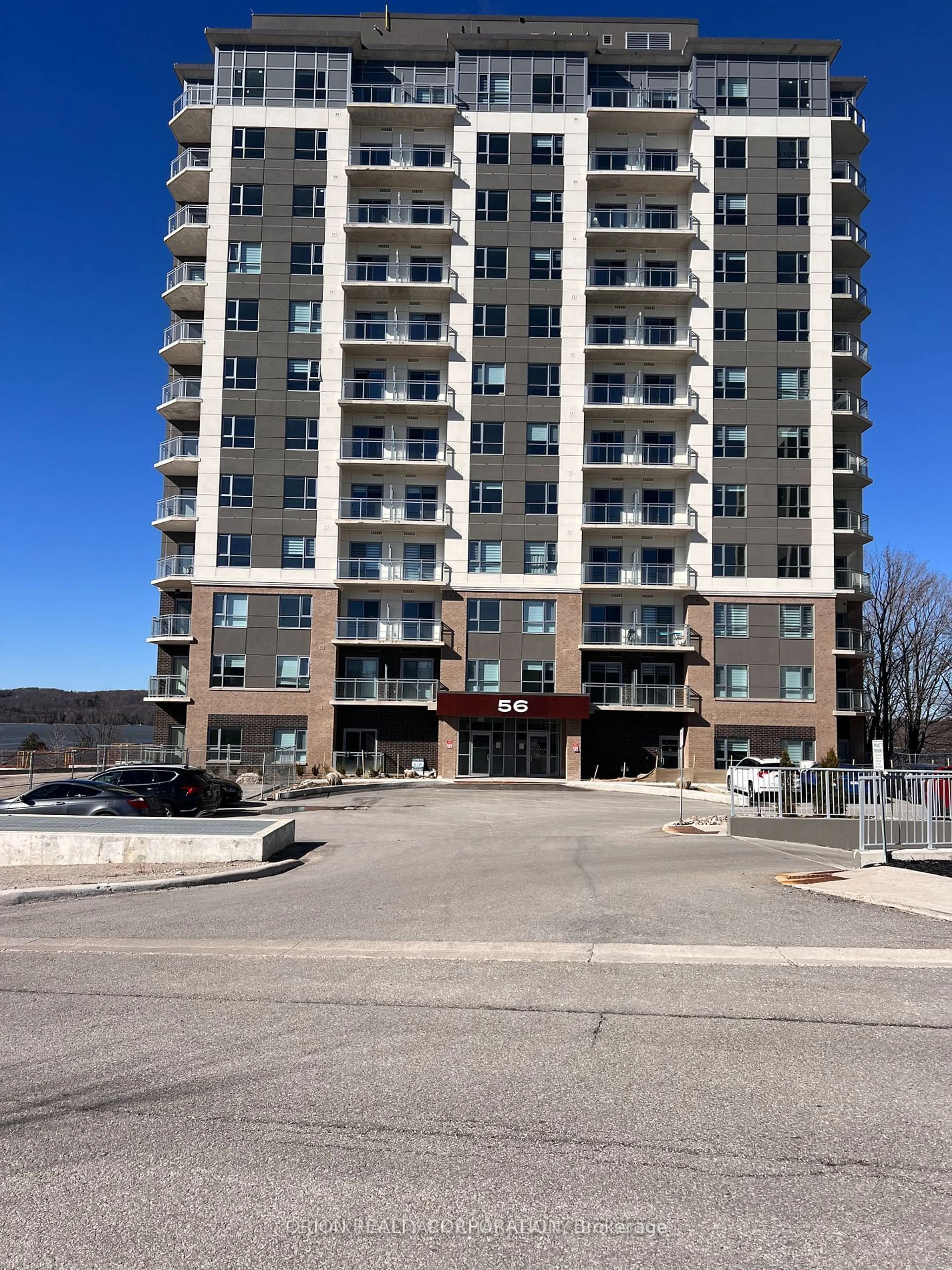 A pic from outside/outdoor area/front of a property/back of a property/a pic from drone, unknown for 56 Lakeside Terr #202, Barrie Ontario L4M 7B9