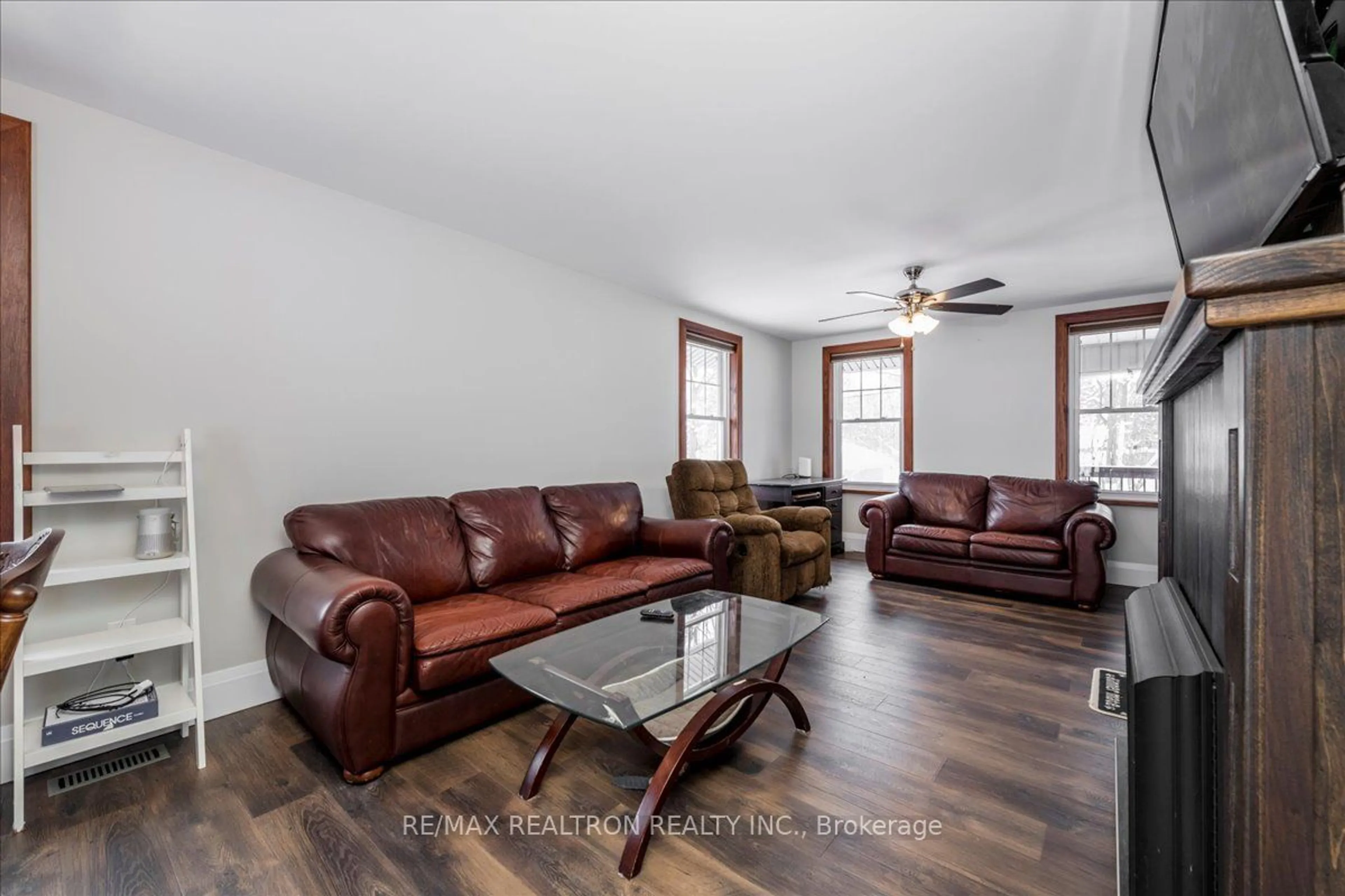 Living room with furniture, wood/laminate floor for 685 7 Line, Oro-Medonte Ontario L0L 0A7