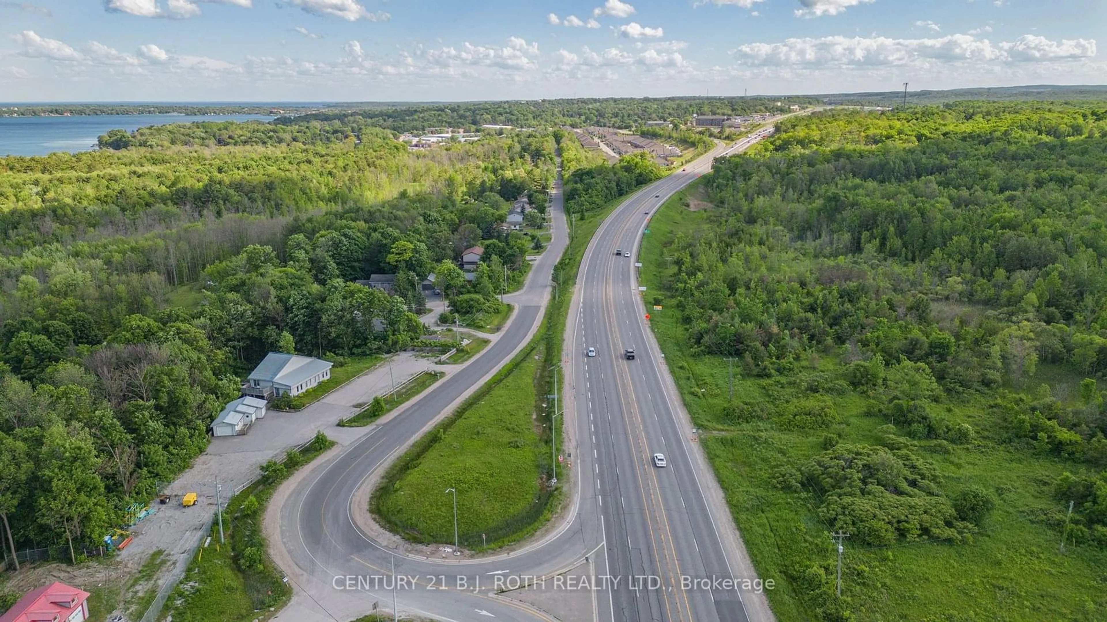 A pic from outside/outdoor area/front of a property/back of a property/a pic from drone, street for 4201 Huronia Rd, Severn Ontario L3V 6H3