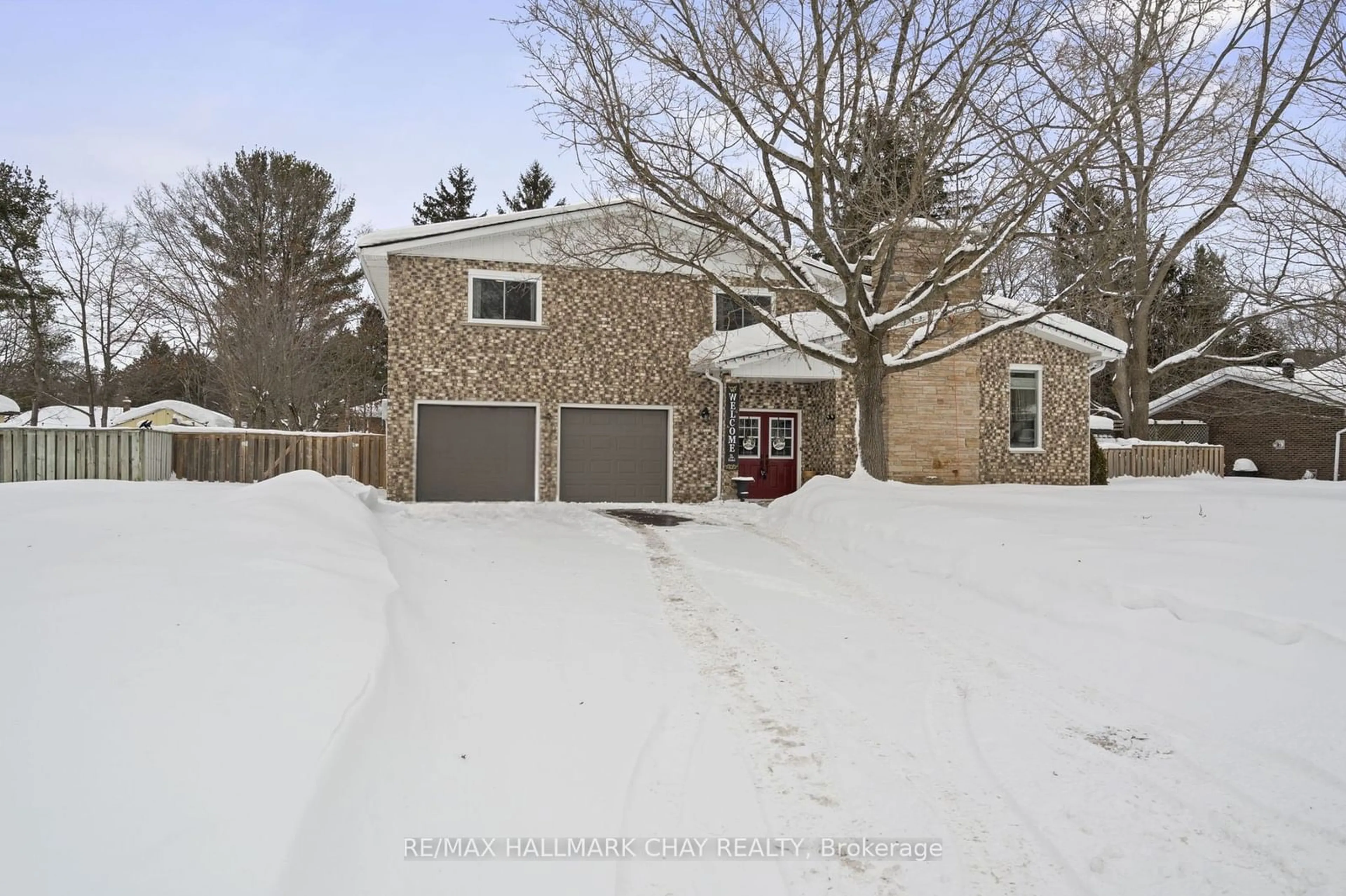 A pic from outside/outdoor area/front of a property/back of a property/a pic from drone, street for 2 Maplecrest Rd, Springwater Ontario L0L 1X1