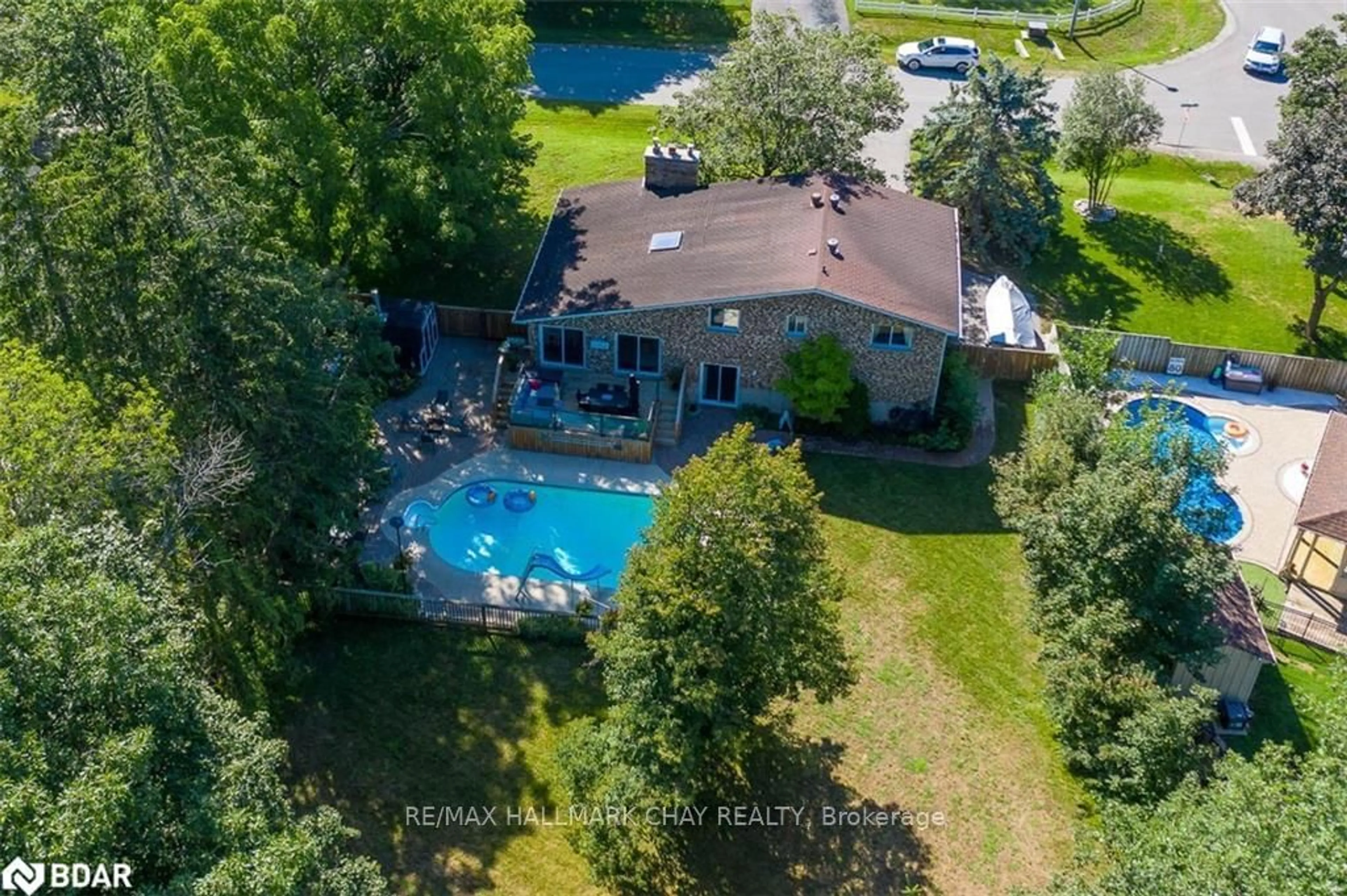 A pic from outside/outdoor area/front of a property/back of a property/a pic from drone, water/lake/river/ocean view for 2 Maplecrest Rd, Springwater Ontario L0L 1X1