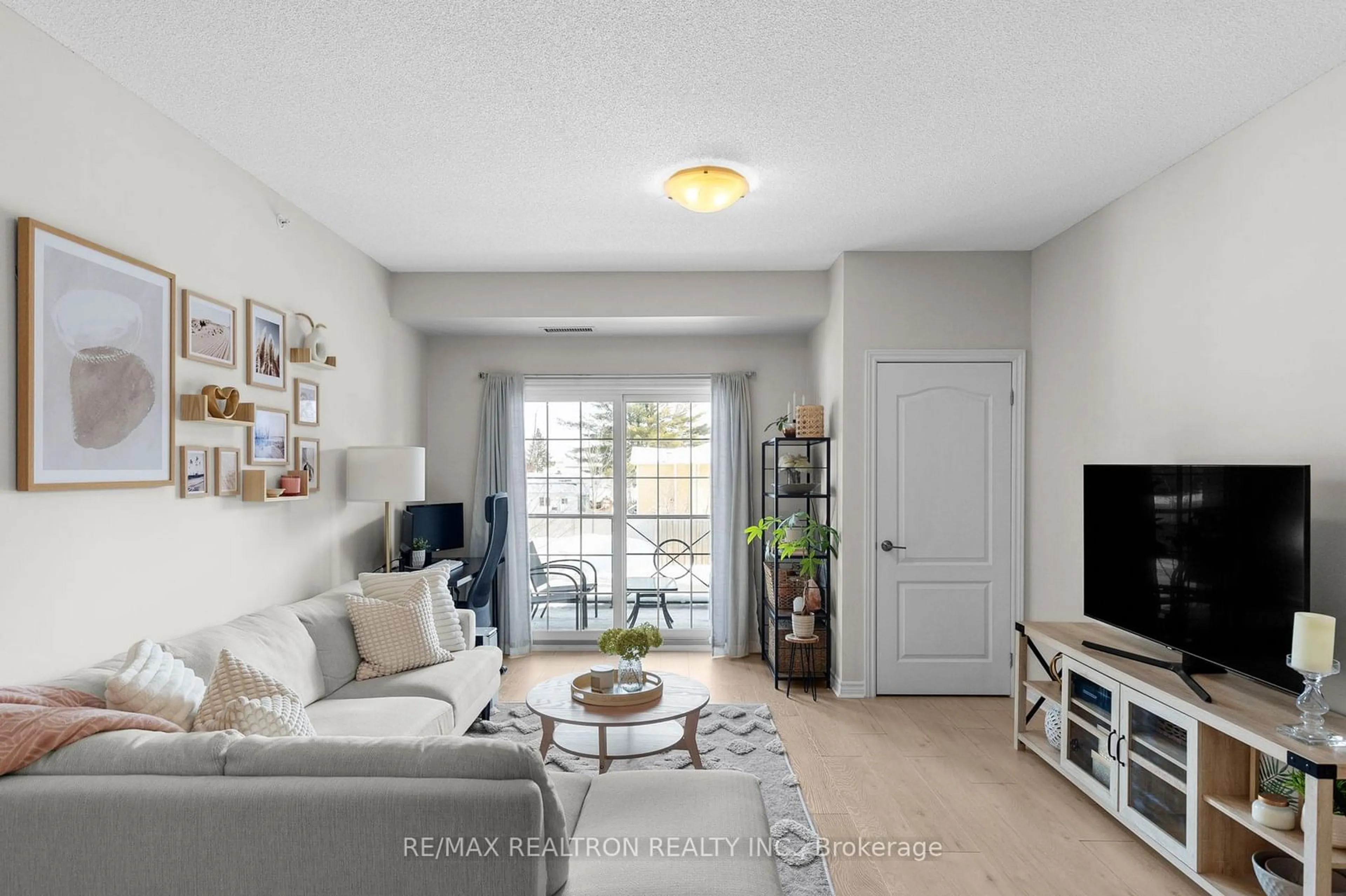 Living room with furniture, unknown for 45 Ferndale Dr #107, Barrie Ontario L4N 5W7