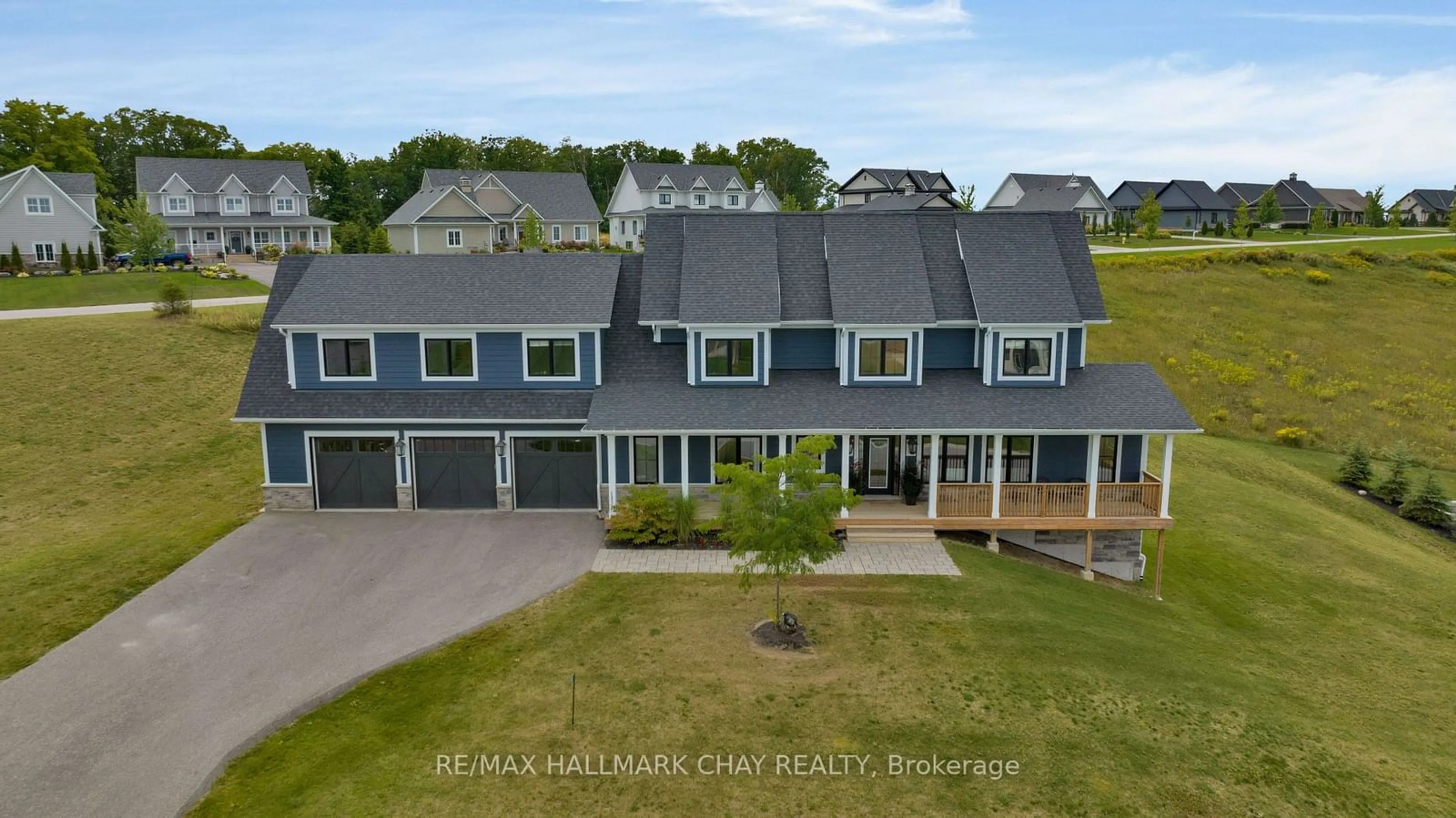 A pic from outside/outdoor area/front of a property/back of a property/a pic from drone, water/lake/river/ocean view for 28 Thoroughbred Dr, Oro-Medonte Ontario L0K 1E0