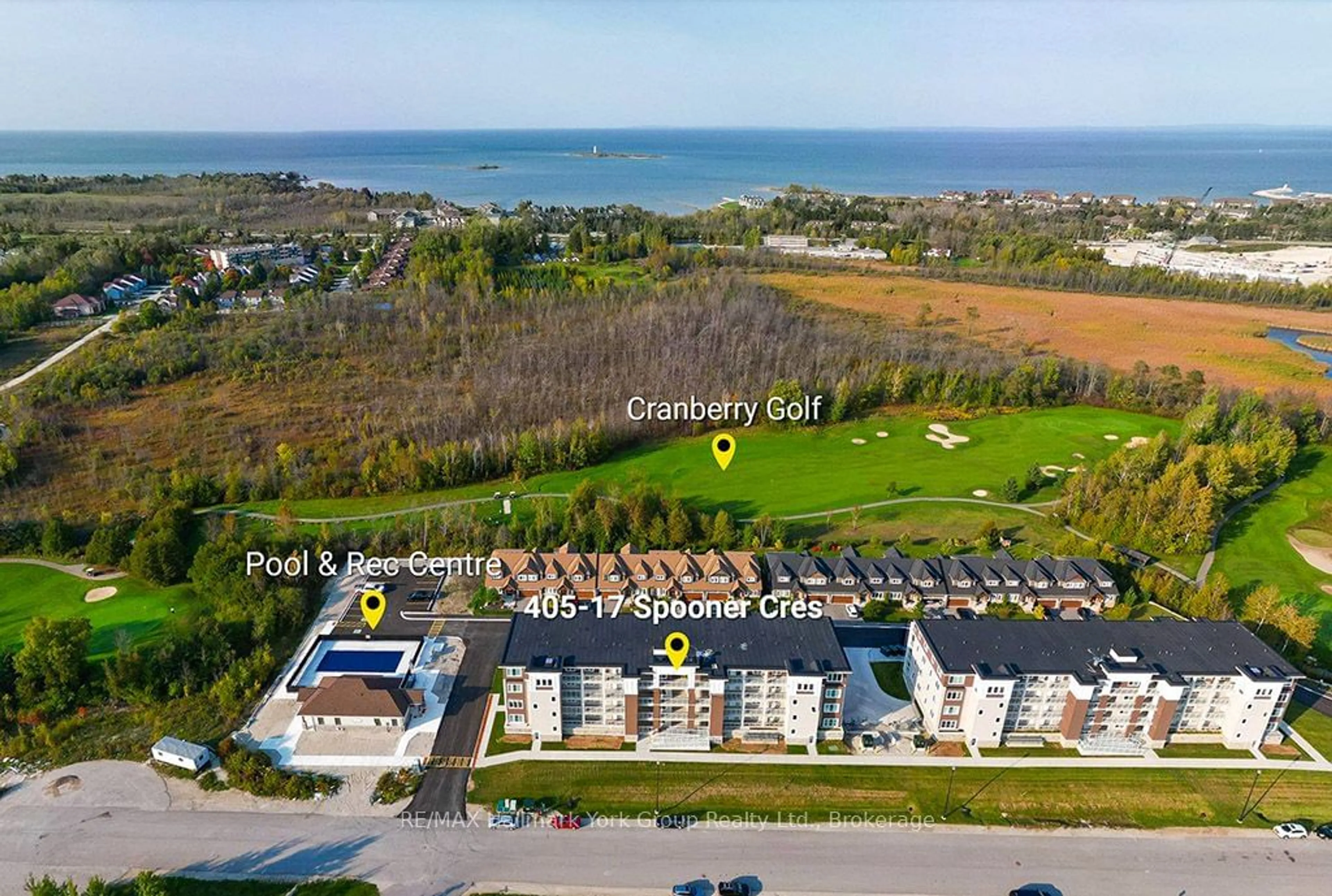 A pic from outside/outdoor area/front of a property/back of a property/a pic from drone, water/lake/river/ocean view for 17 Spooner Cres #405, Collingwood Ontario L9Y 1T3