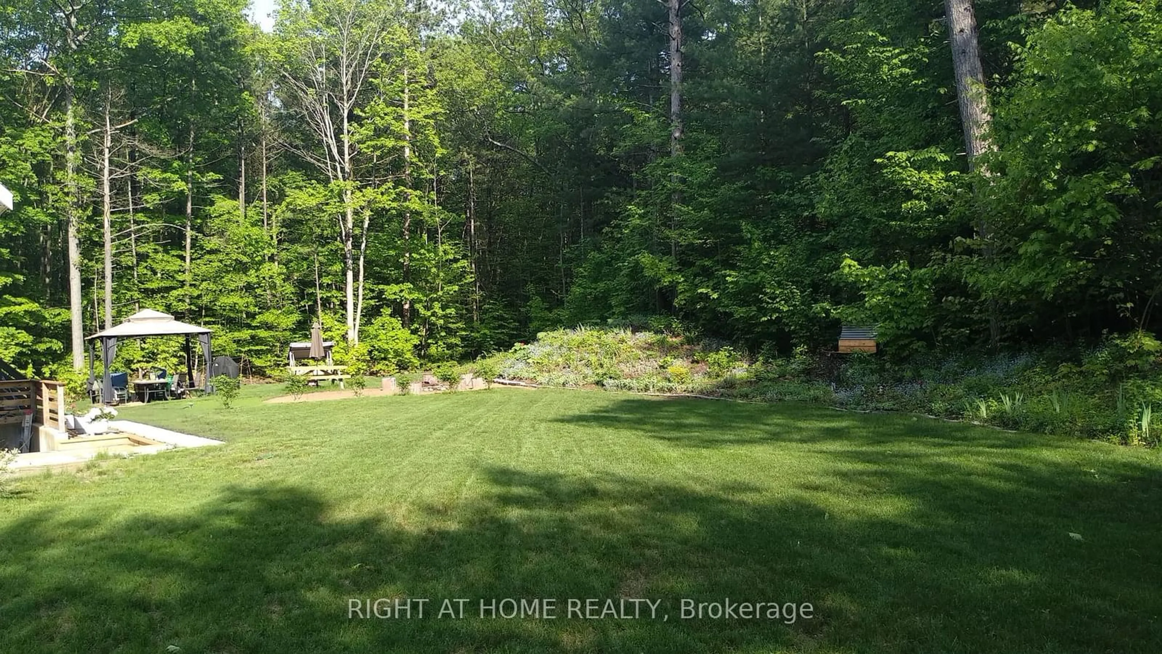 A pic from outside/outdoor area/front of a property/back of a property/a pic from drone, forest/trees view for 37 Moreau Pkwy, Tiny Ontario L9M 0H3