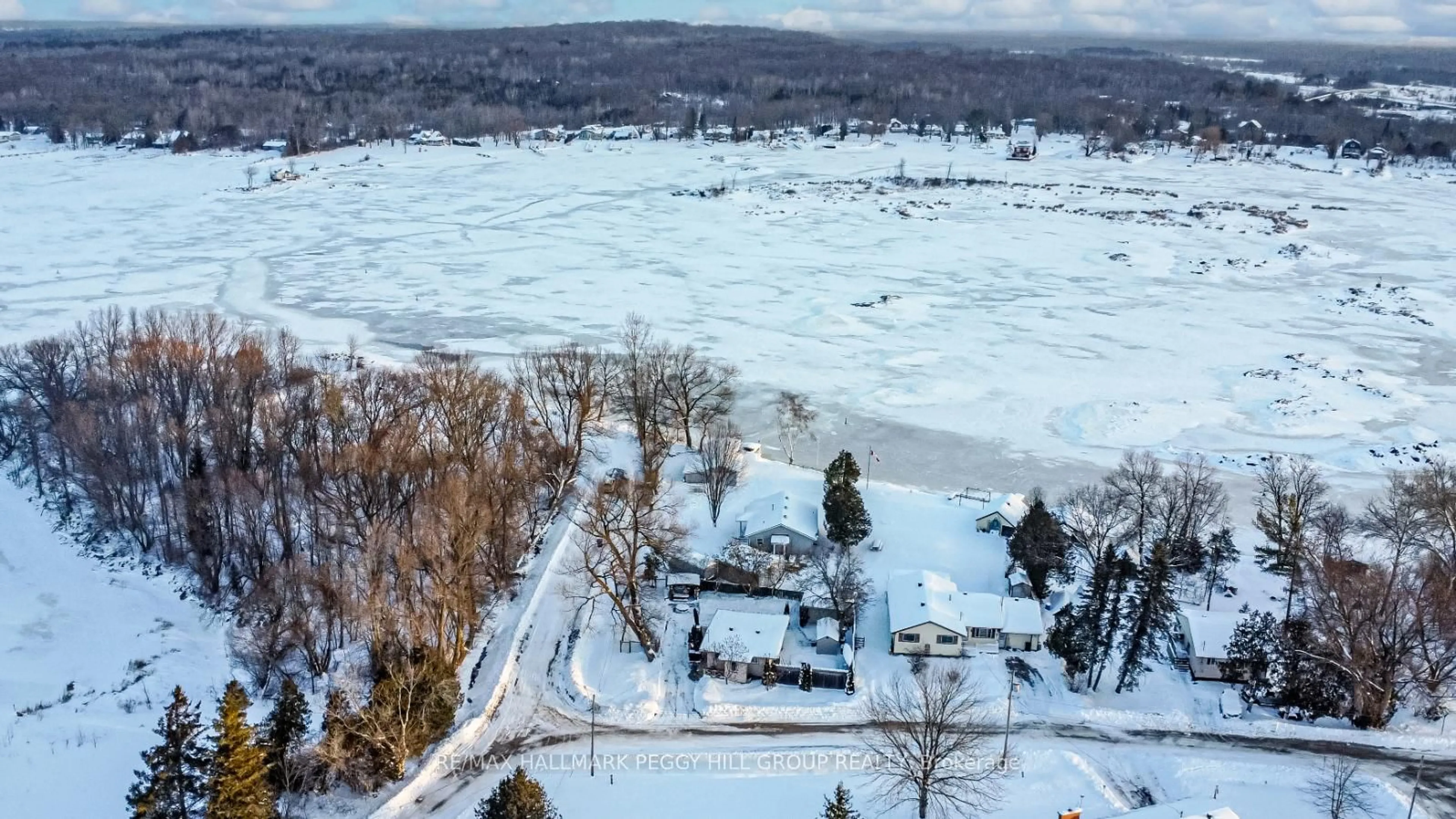 A pic from outside/outdoor area/front of a property/back of a property/a pic from drone, water/lake/river/ocean view for 12 Balsam St, Tay Ontario L0K 2C0