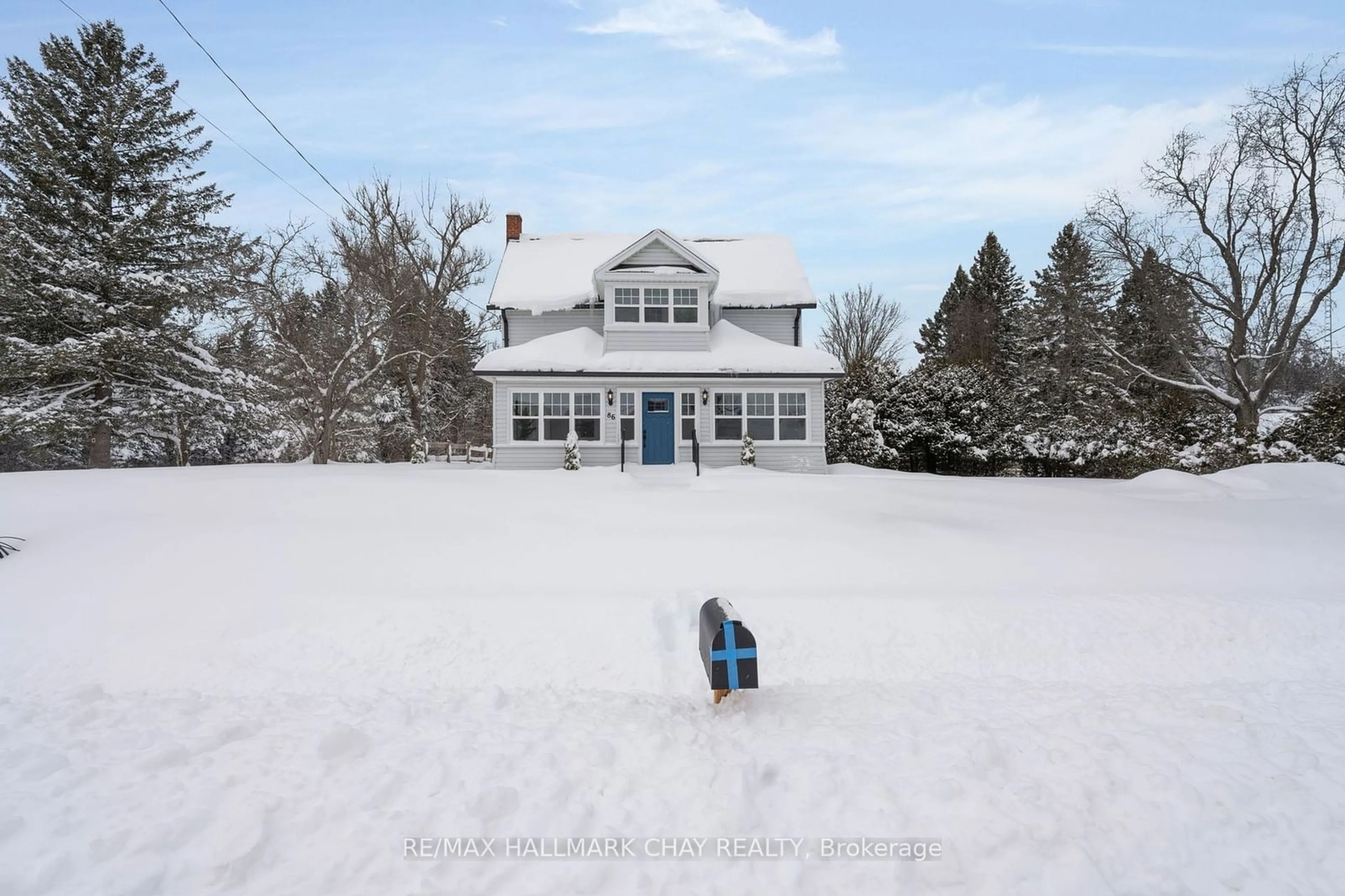 A pic from outside/outdoor area/front of a property/back of a property/a pic from drone, street for 86 Mill St, Springwater Ontario L0L 1V0